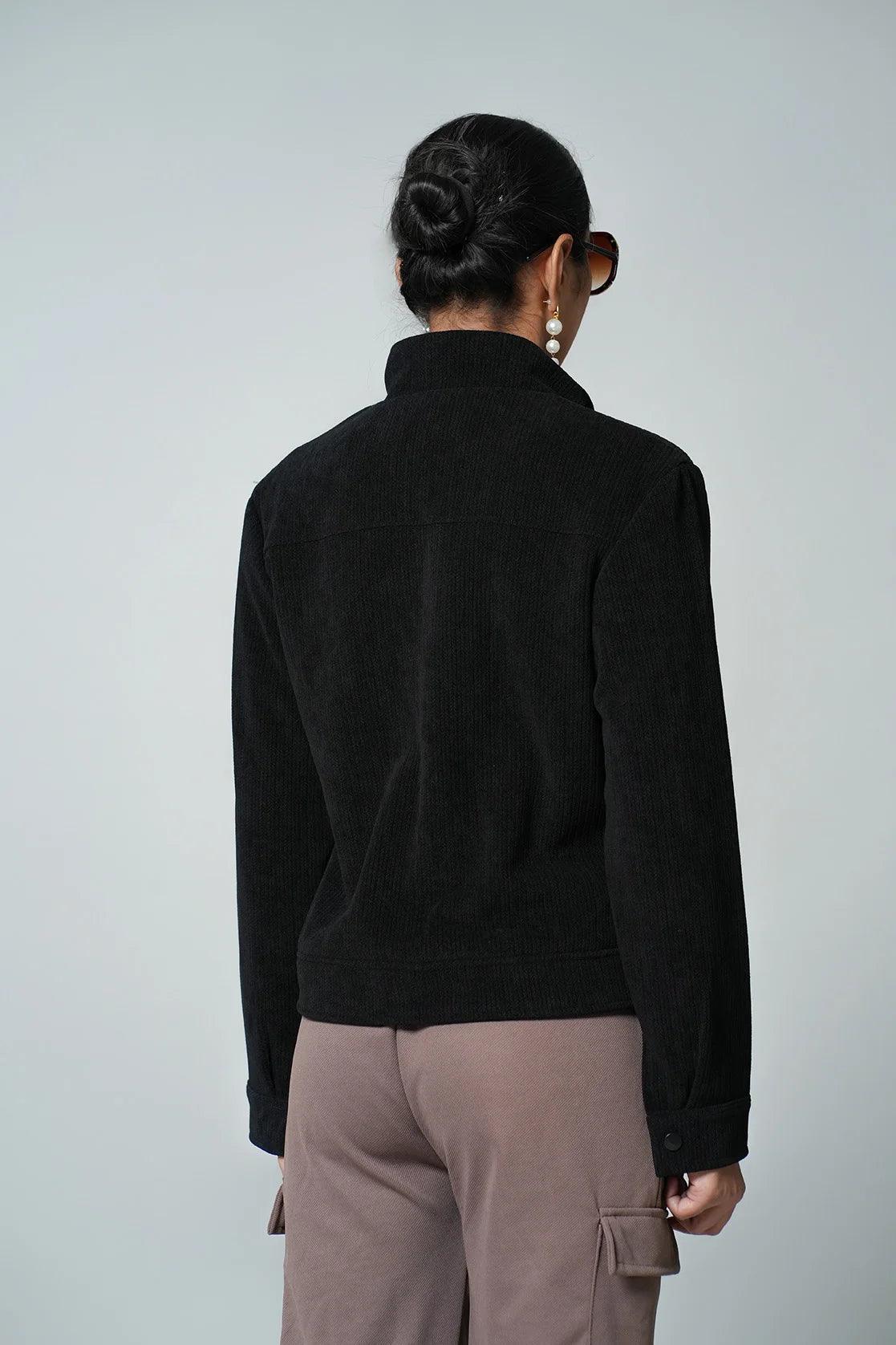 Upgrade your wardrobe with the Fort Collins Women's Black Corduroy Jacket, featuring a stylish stand collar. Purchase online for a fashionable addition to your closet, now available in India.