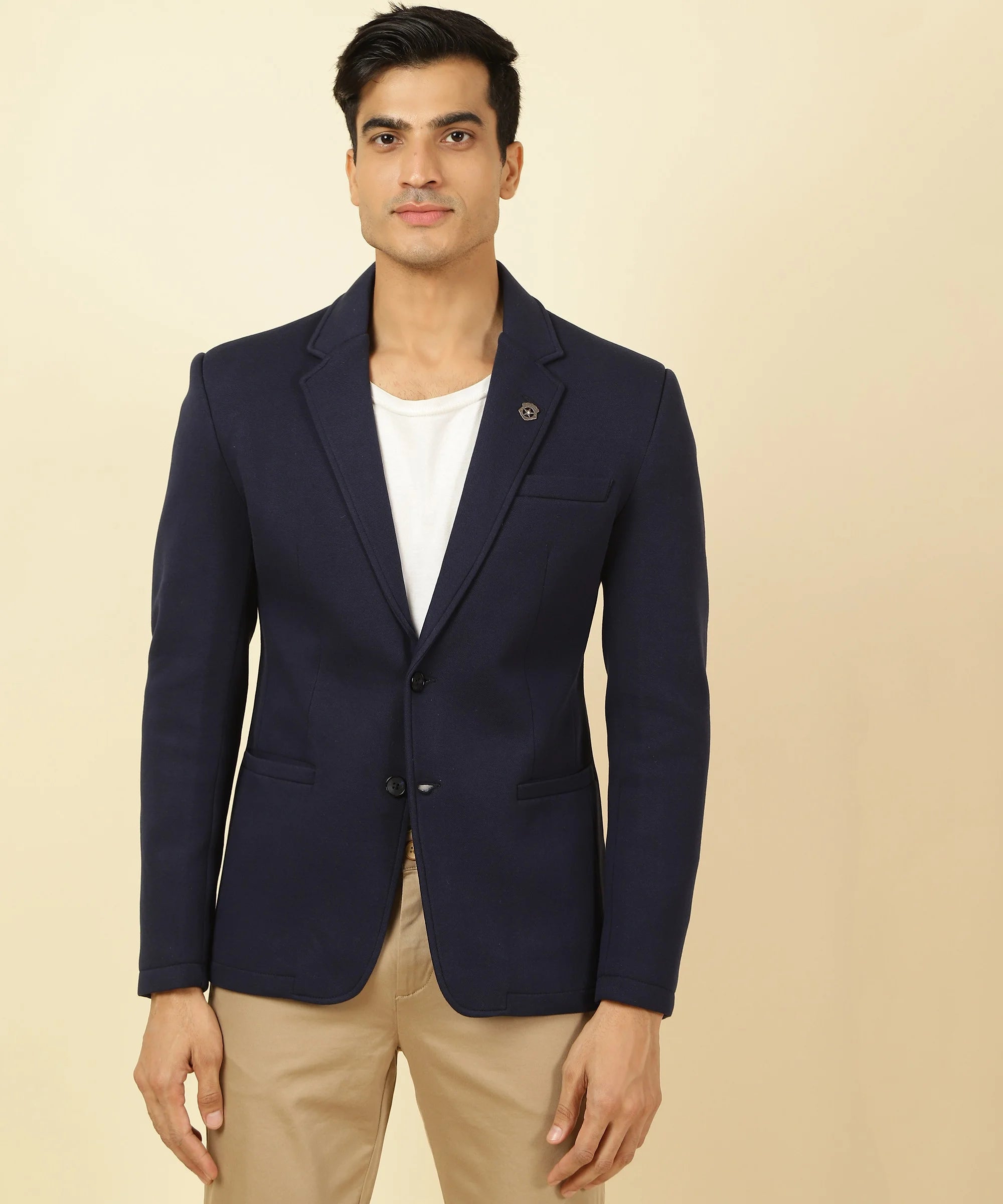 Upgrade your wardrobe with the Fort Collins Men's Navy Cotton Blend Knitted Blazer, featuring a notched lapel for a trendy and sophisticated look. Shop now online in India.