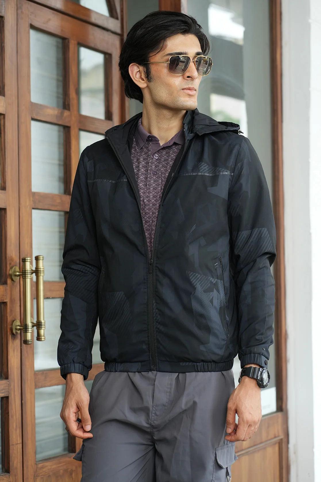 Enhance your wardrobe with this Fort Collins Men's Black Lightweight Windbreaker Jacket. Perfect for any occasion, this jacket features a detachable hood and is available for online purchase from anywhere in India.