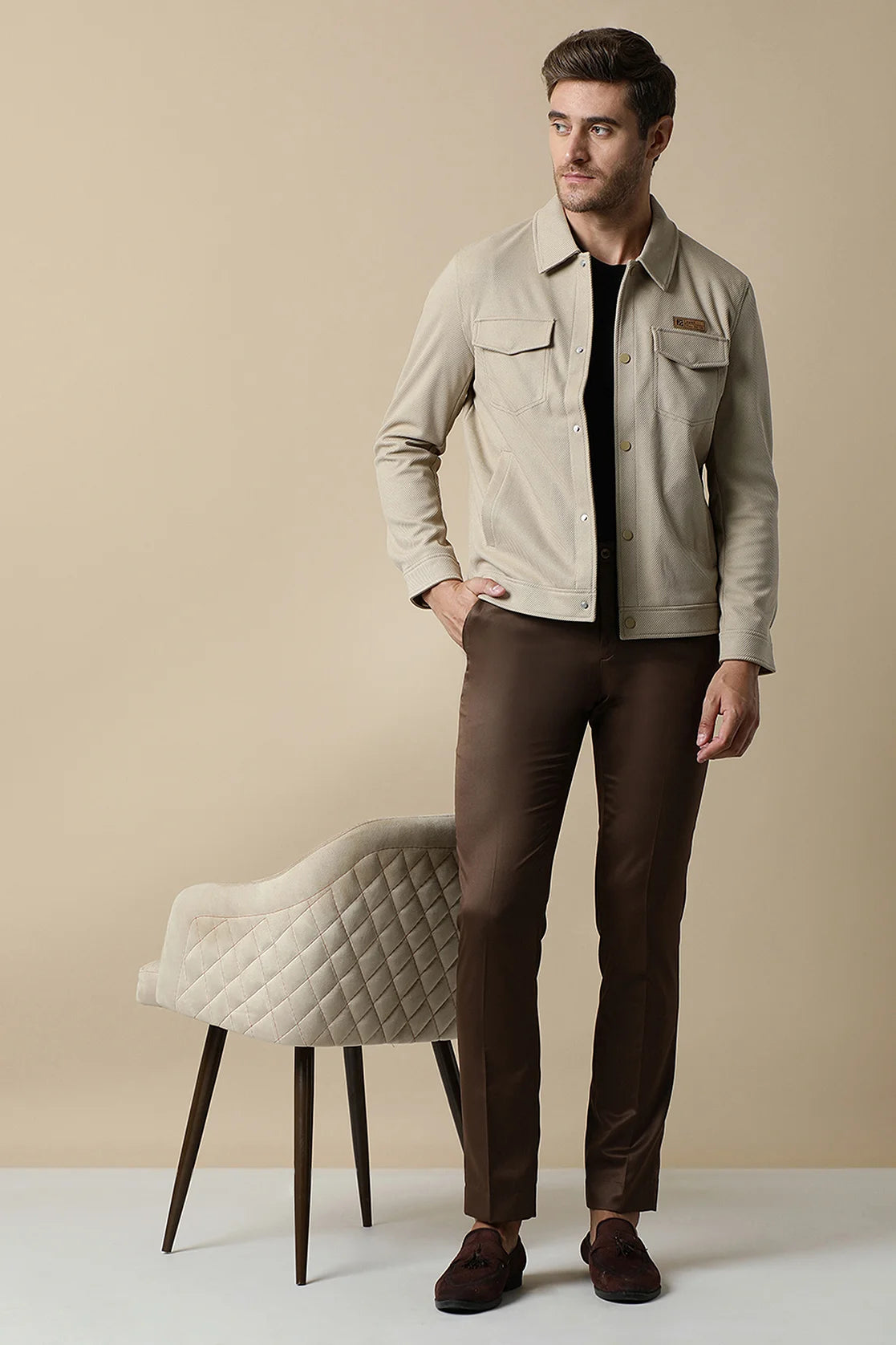 Experience a stylish wardrobe upgrade from the comfort of your home in India with the Fort Collins Men's Beige Button-Up Knitted Jacket, now available for purchase online.