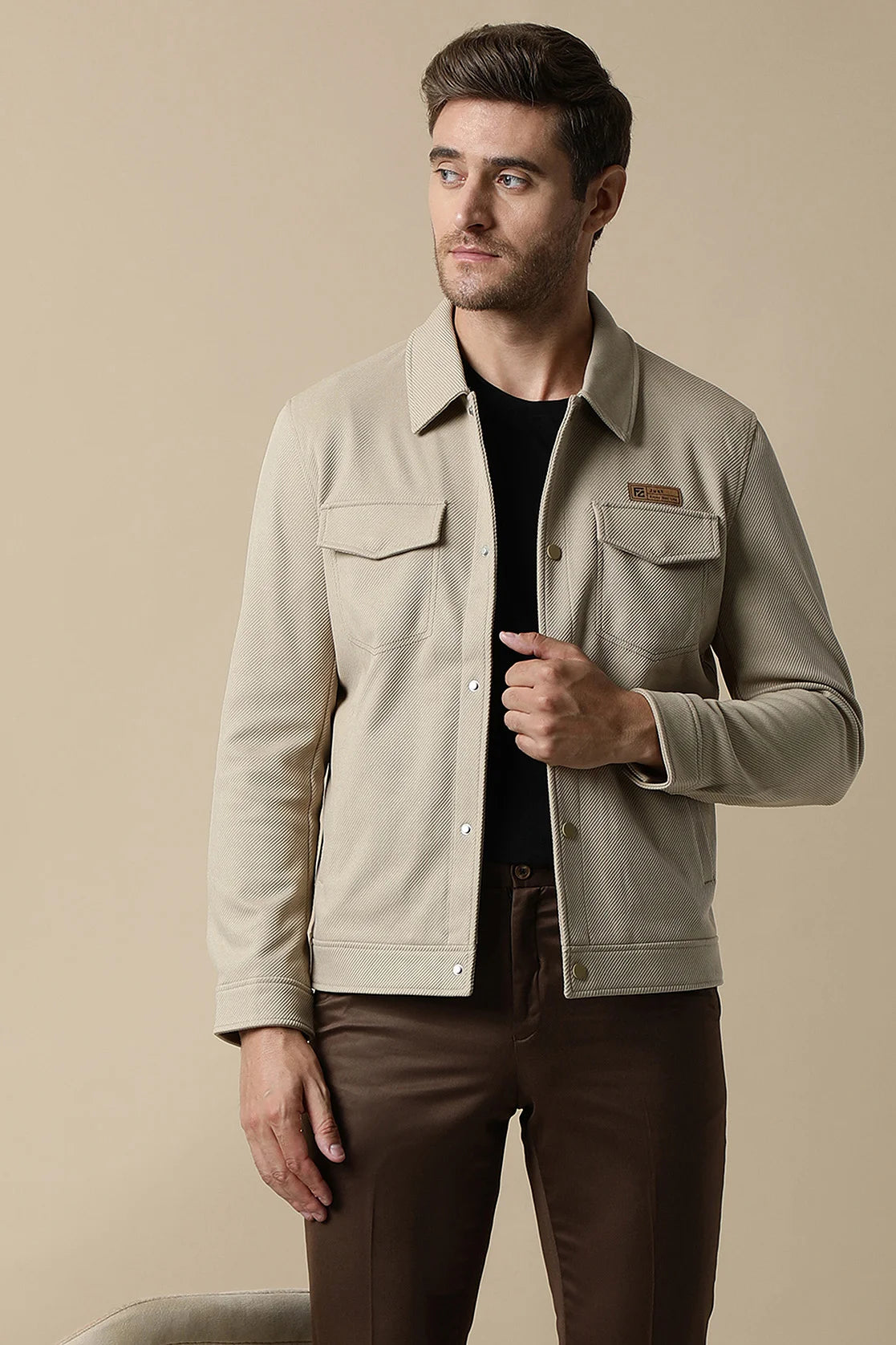 This Men's Beige Button-Up Knitted Jacket from Fort Collins is a must-have for any fashion-forward individual. Shop online from anywhere in India to elevate your wardrobe with the latest trend.