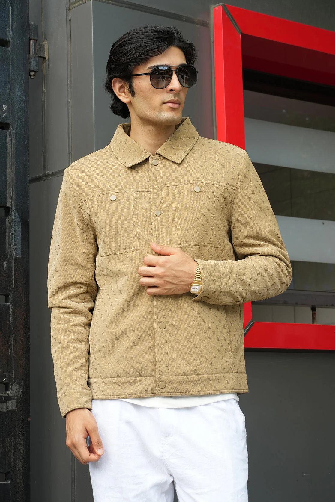 Discover the Fort Collins Men's Beige Embossed Pattern Shacket, available exclusively online in India. Featuring a snap button closure, this shacket is the perfect combination of style and functionality for any man's wardrobe.