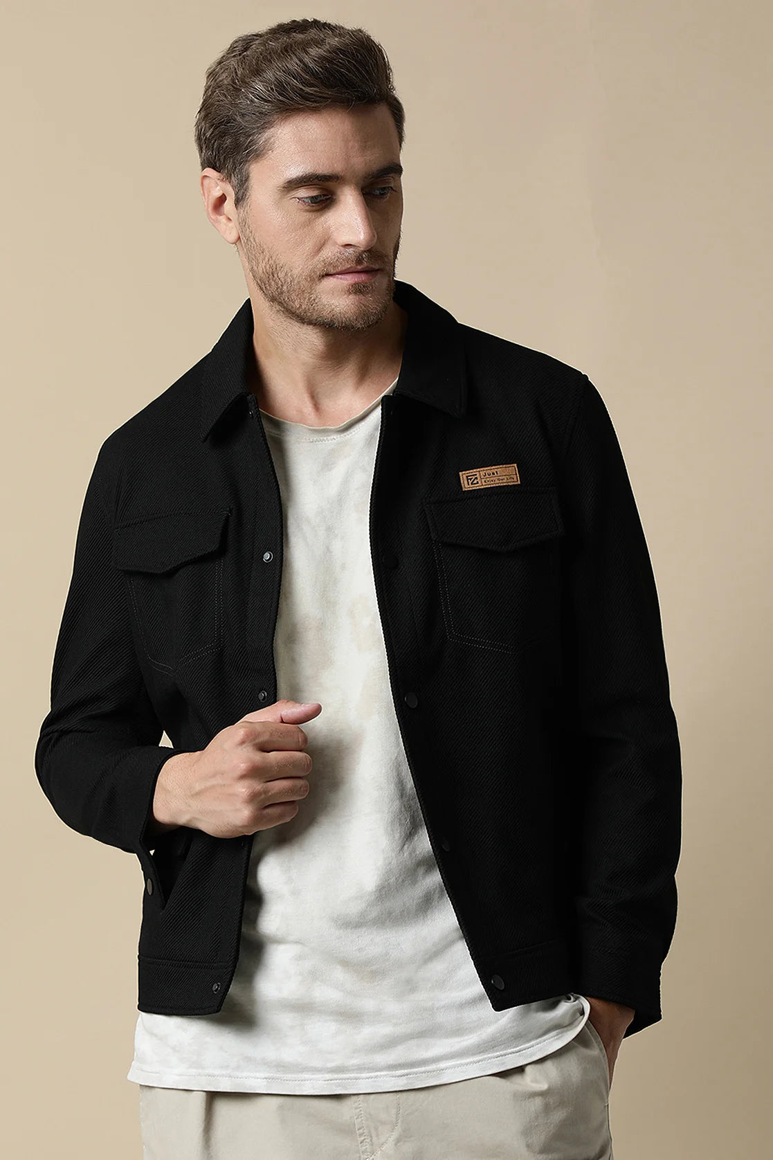 Discover the stylish Men's Black Button-Up Knitted Jacket by Fort Collins, now available for purchase online from anywhere in India. Elevate your wardrobe with this must-have piece.