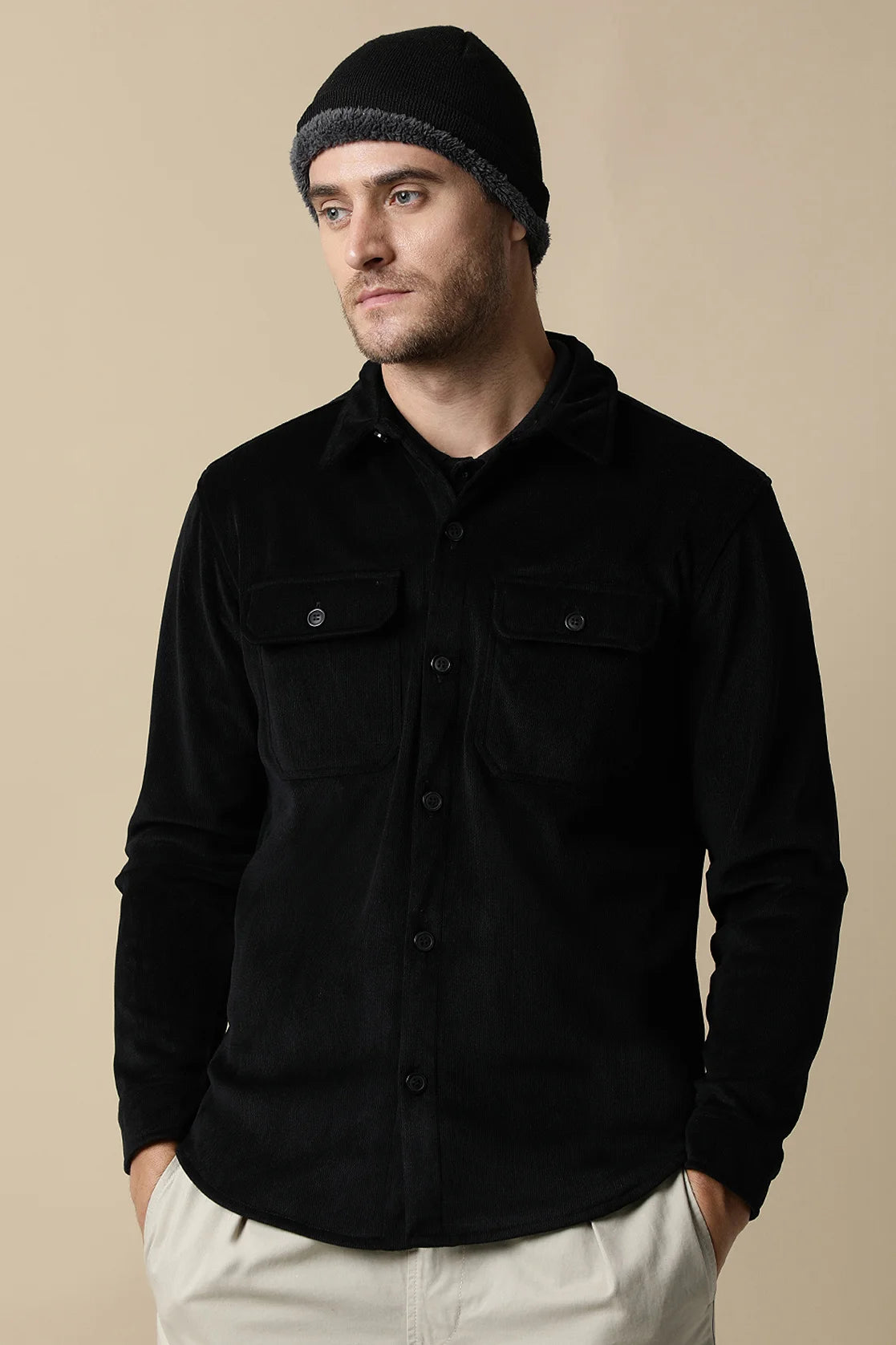 Upgrade your wardrobe with the Fort Collins Men's Black Corduroy Shacket featuring dual chest pockets. Available for online purchase from anywhere in India - shop now.