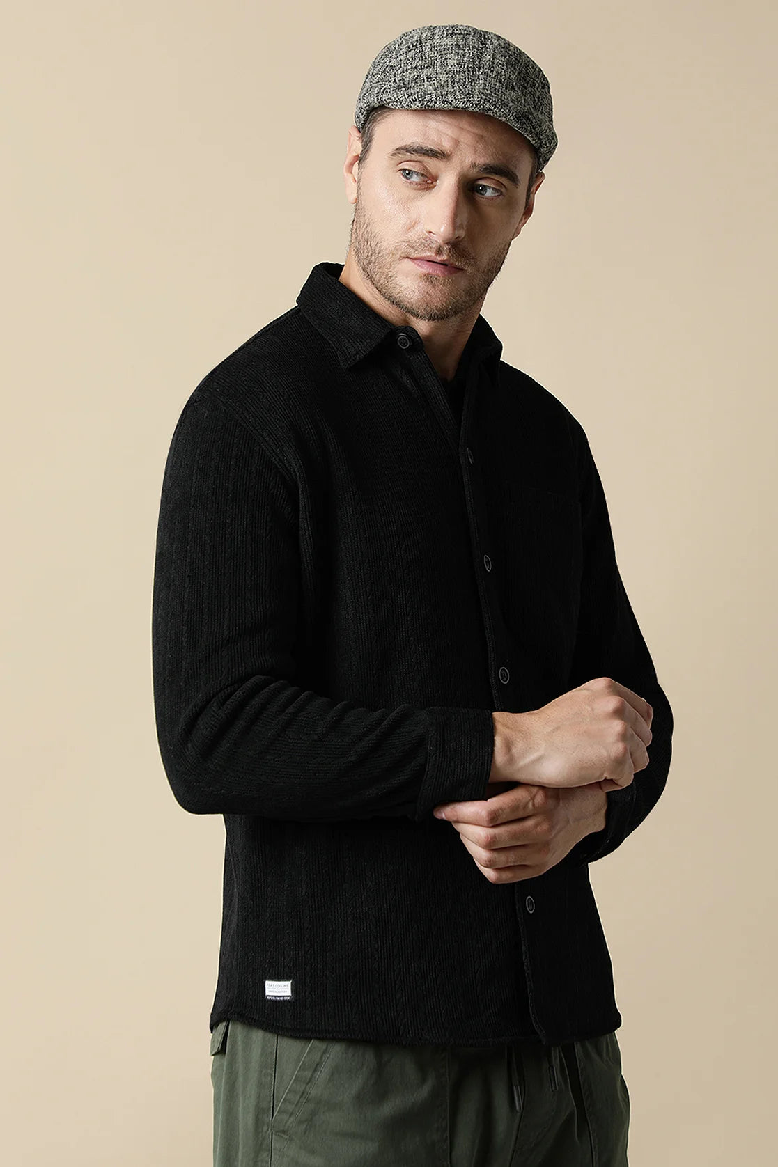 Upgrade your wardrobe with the Fort Collins Men's Black Knitted Button Down Shacket, available for purchase online from anywhere in India. Stay on-trend with this stylish and versatile piece that is perfect for any occasion.