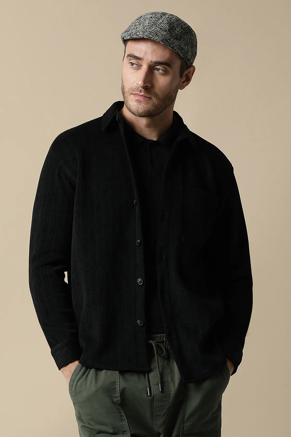 Upgrade your wardrobe with the fashionable Fort Collins Men's Black Knitted Button Down Shacket, now available for purchase online from anywhere in India.