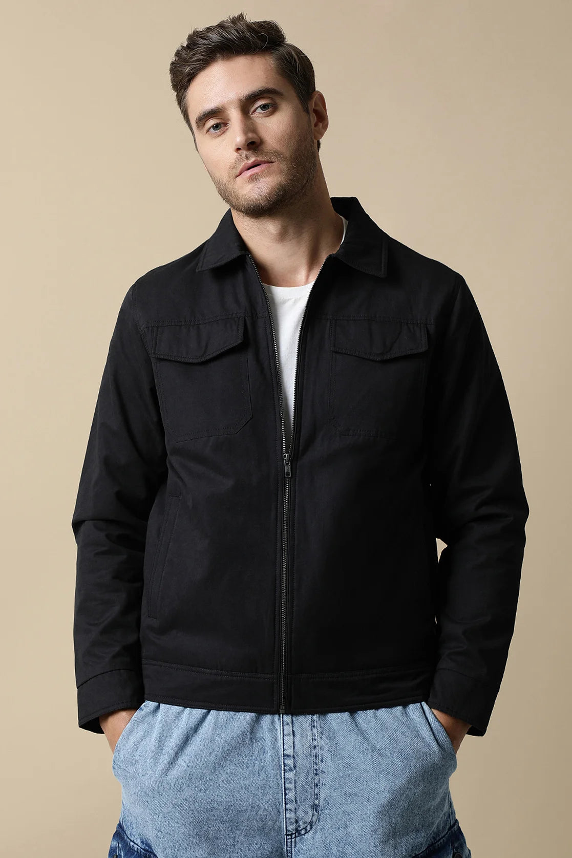 Shop now for a trendy wardrobe upgrade from anywhere in India with the Fort Collins Men's Black Lightweight Jacket featuring dual chest pockets. Perfect for a stylish yet practical look.