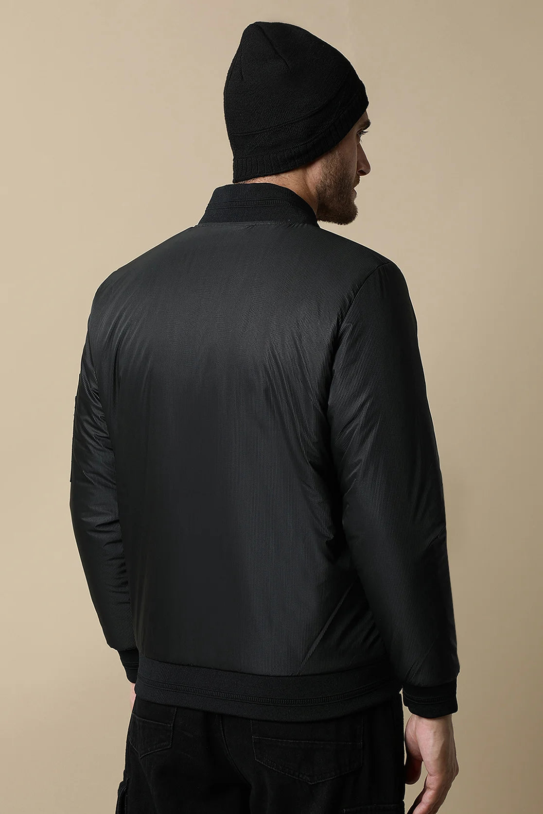 Purchase the Fort Collins Men's Black Lightweight Jacket with Ribbed Collar today and upgrade your wardrobe with a stylish addition from anywhere in India.