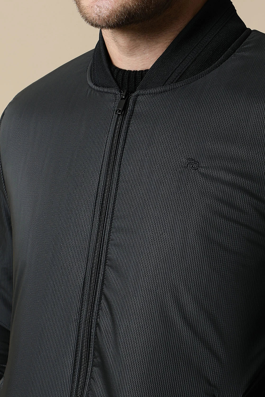 Shop now for a stylish, lightweight black jacket with ribbed collar for men by Fort Collins, available for purchase online from anywhere in India.