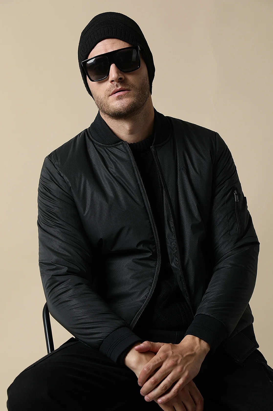 Shop now for a stylish wardrobe from anywhere in India with Fort Collins' men's black lightweight jacket featuring a ribbed collar.