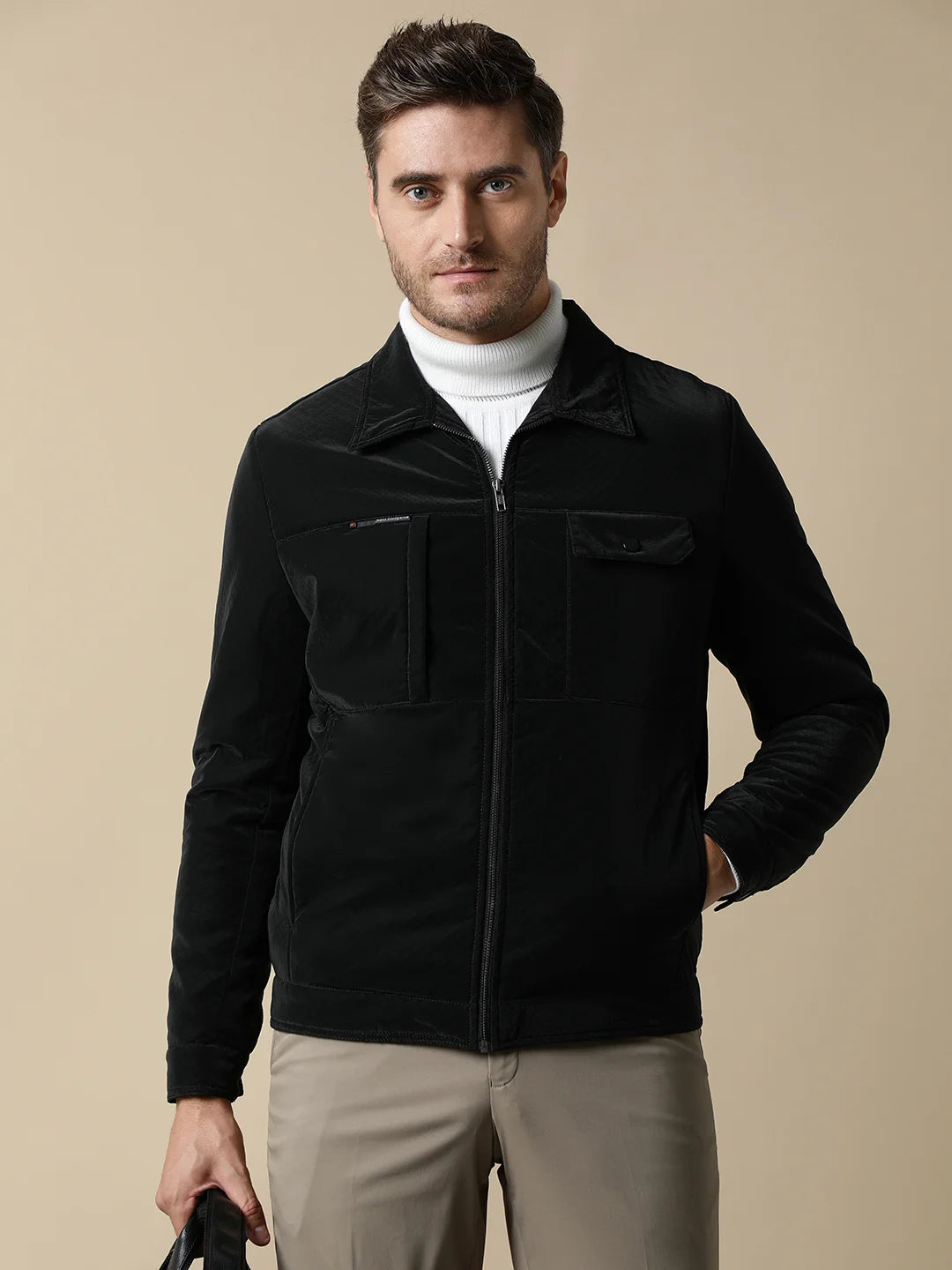 Shop online now for the latest addition to your wardrobe from anywhere in India - the Men's Black PU Coated Jacket with Classic Front Zip, by Fort Collins. Discover a stylish and versatile piece crafted with quality materials, perfect for any occasion.