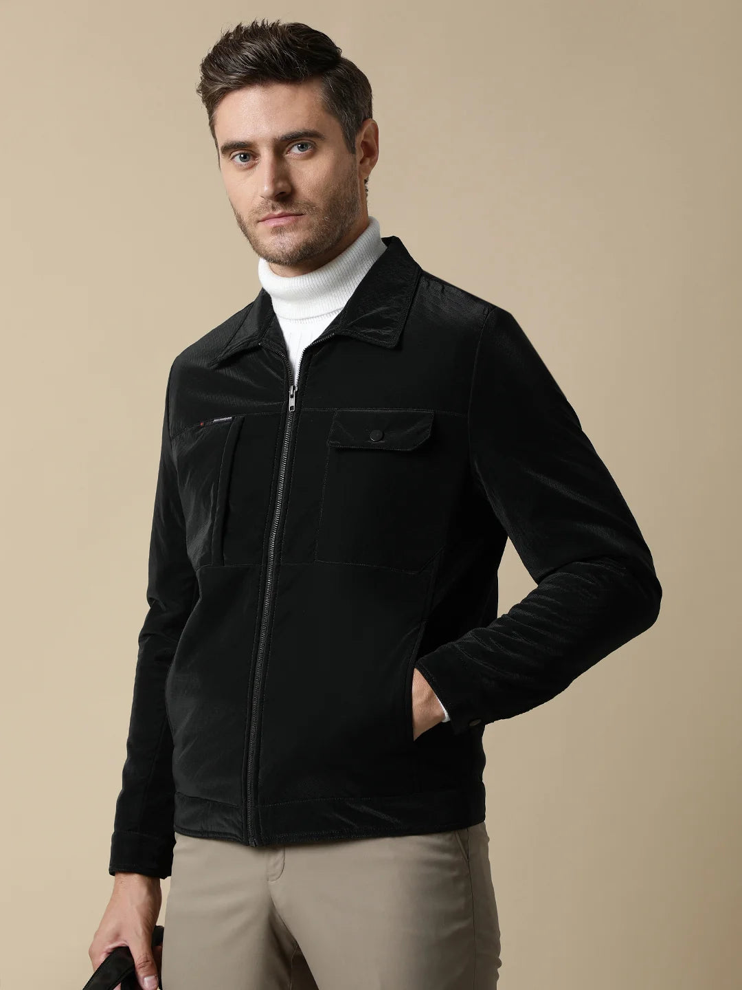 Discover the sleek style of our Fort Collins Men's Black PU Coated Jacket. With a classic front zip and the convenience of online shopping, this is a must-have addition to your wardrobe, available throughout India.