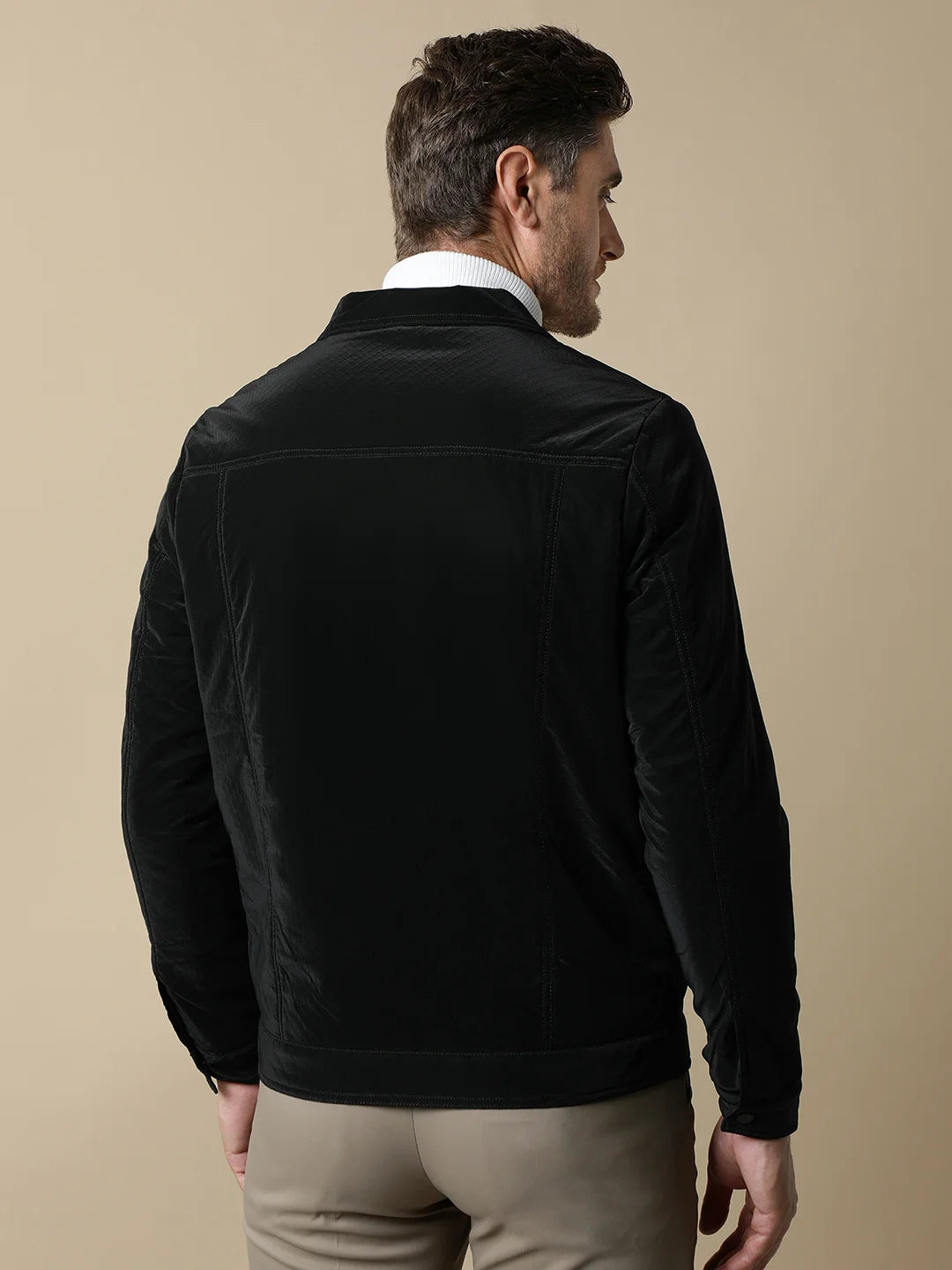 This stylish Men's Black PU Coated Jacket with Classic Front Zip by Fort Collins is now available for purchase online, making it a must-have addition to any wardrobe in India.