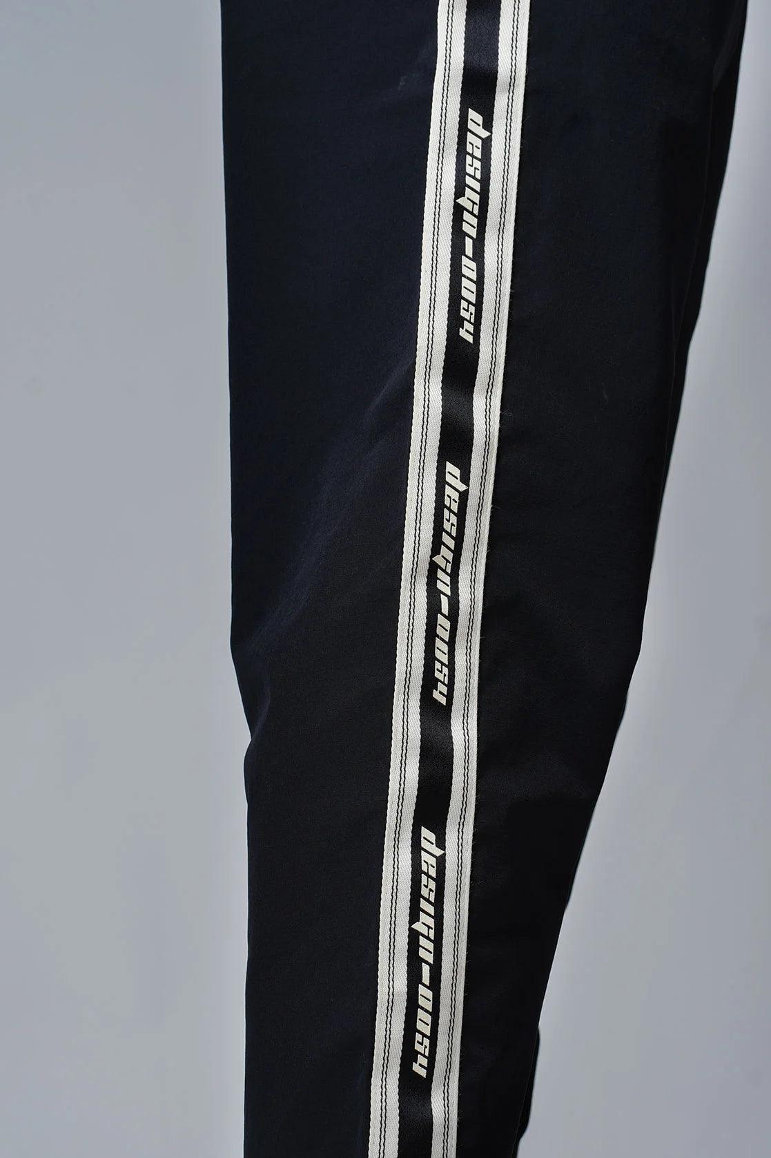 Acquire Fort Collins' Black Ripstop Track Pant for Men with Zipper Pockets via online purchase in India.