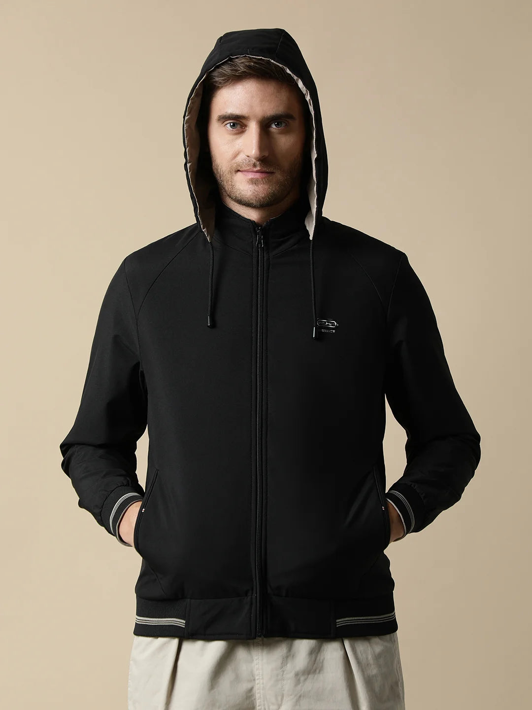 Explore Fort Collins' Men's Black Reversible Windbreaker with a detachable hood. Upgrade your wardrobe with the latest fashion from anywhere in India when you shop online.