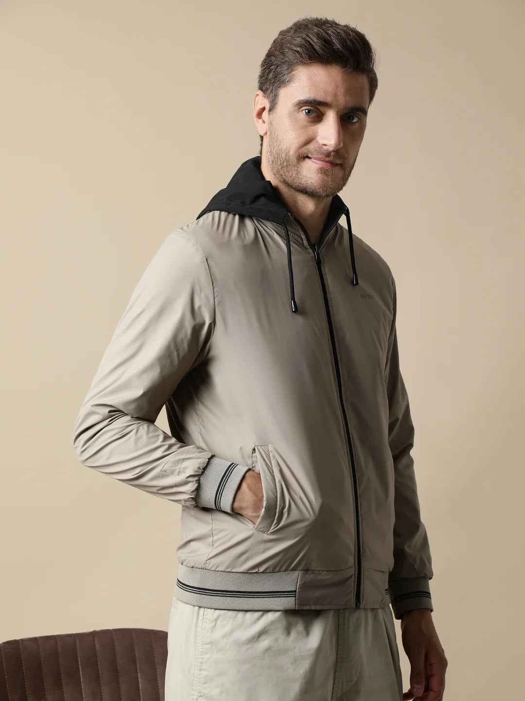 Browse our online selection of Fort Collins Men's Black Reversible Windbreaker with Detachable Hood, perfect for enhancing your wardrobe with a stylish and versatile piece. Available for purchase from anywhere in India.