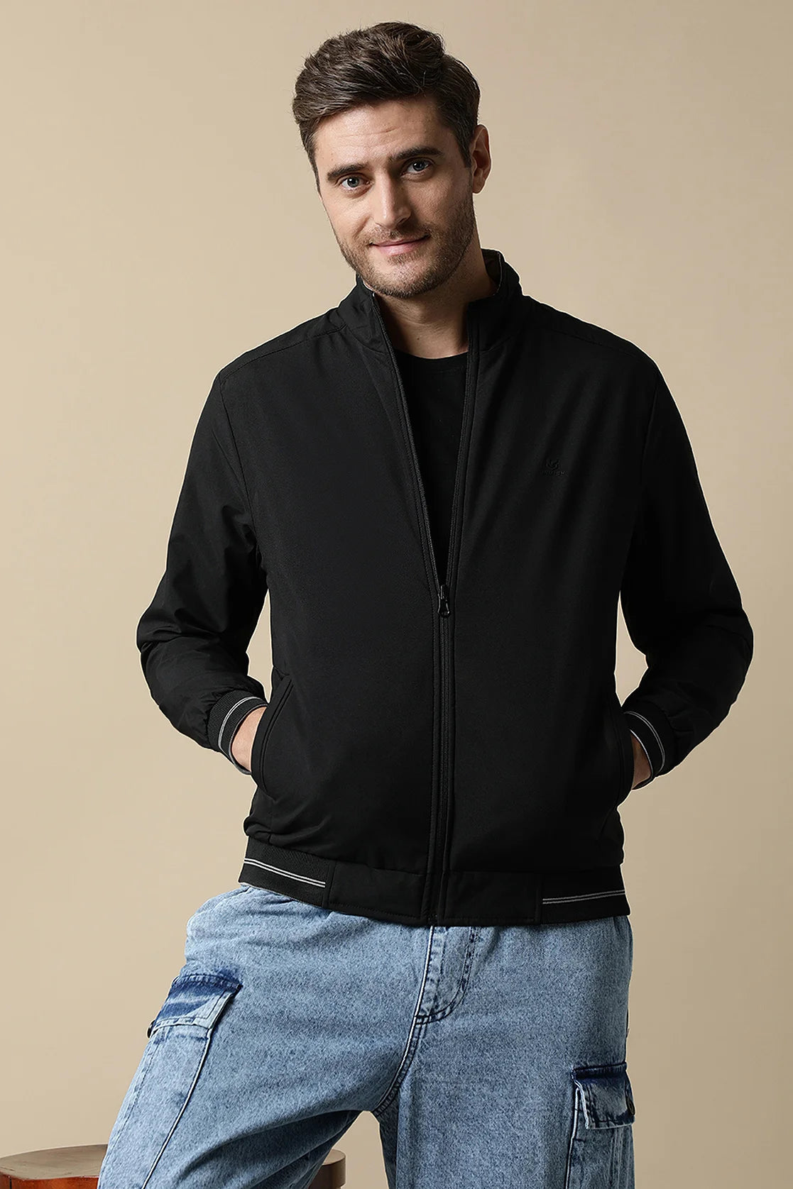 Upgrade your wardrobe with the Fort Collins Men's Black Reversible Windbreaker, featuring a sleek dual-tone design. Shop online now for a stylish addition to your look from anywhere in India.