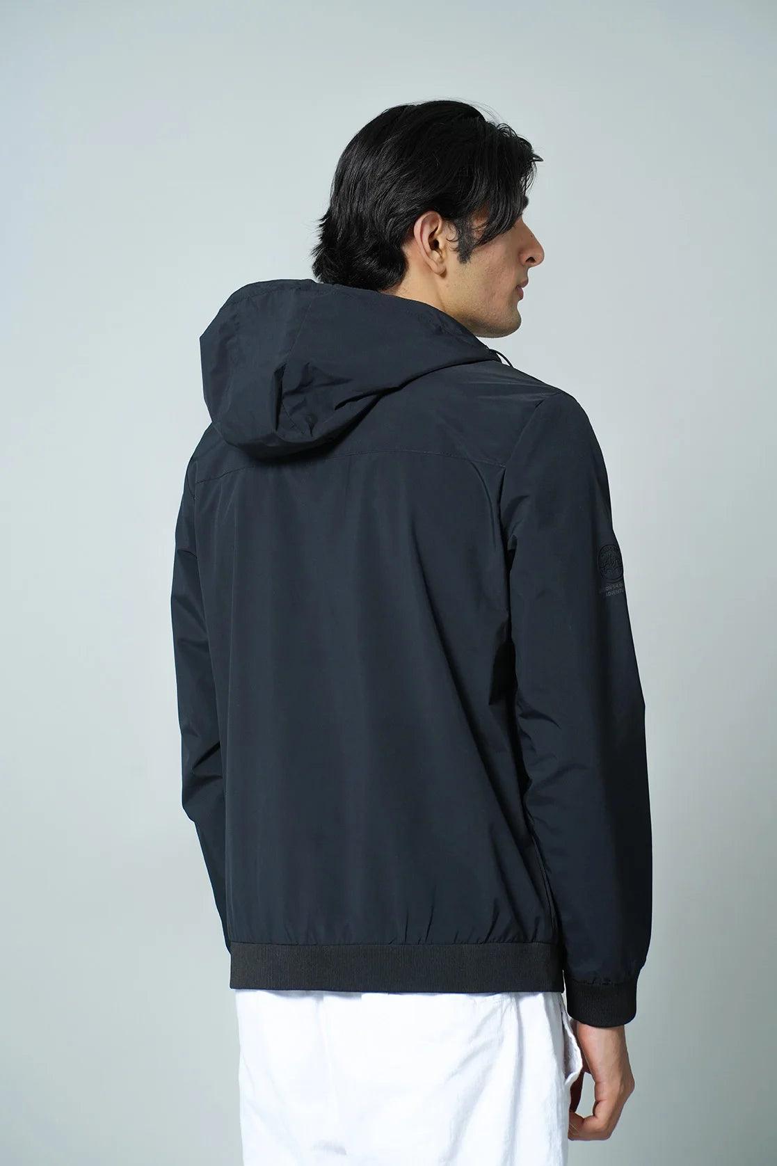 This black windbreaker from Fort Collins for men features an adjustable hood and can be purchased online in India.