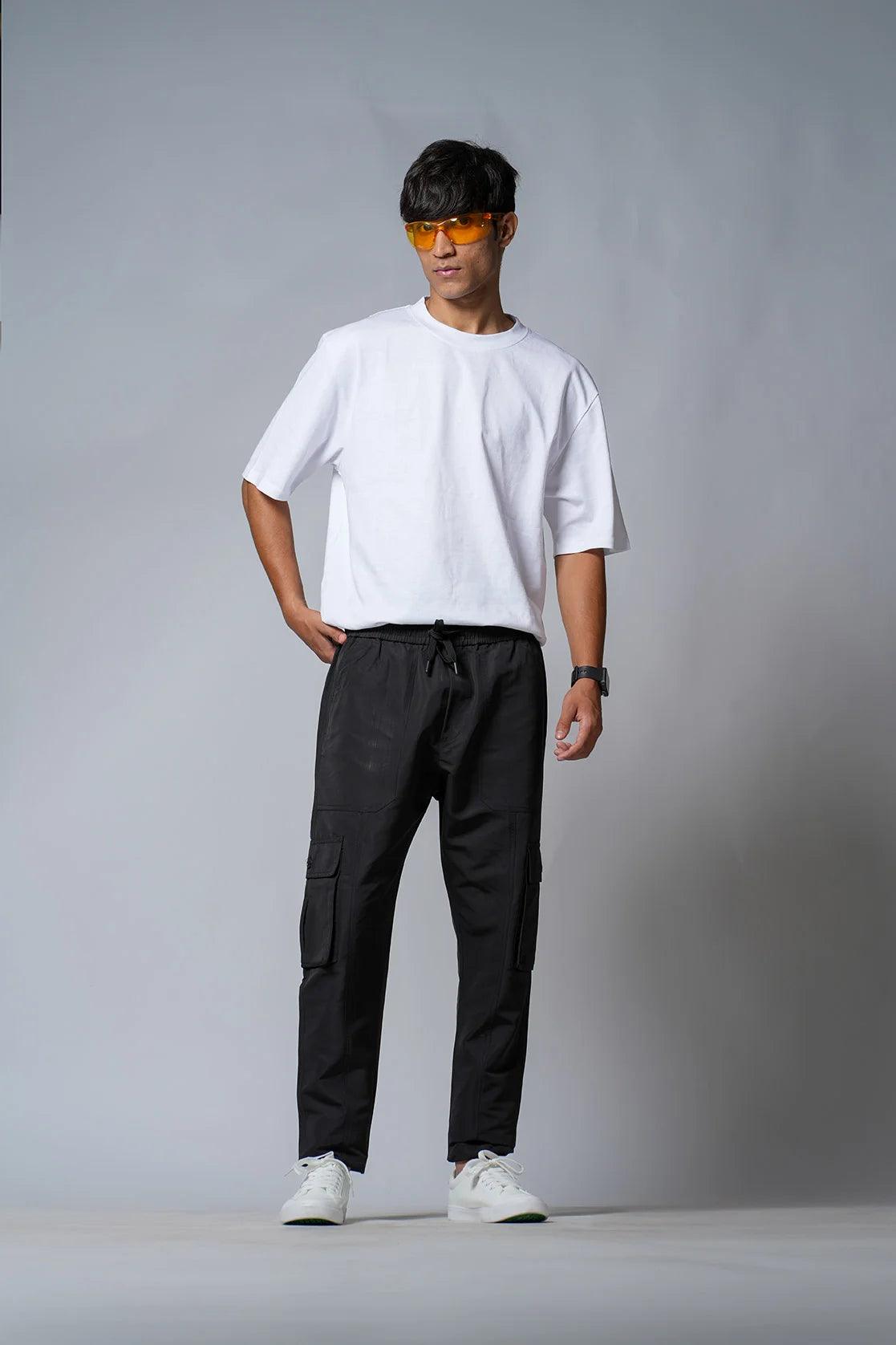 Shop for the Fort Collins Men's Black Smart Fit Track Pant with Multiple Pockets, available online in India.