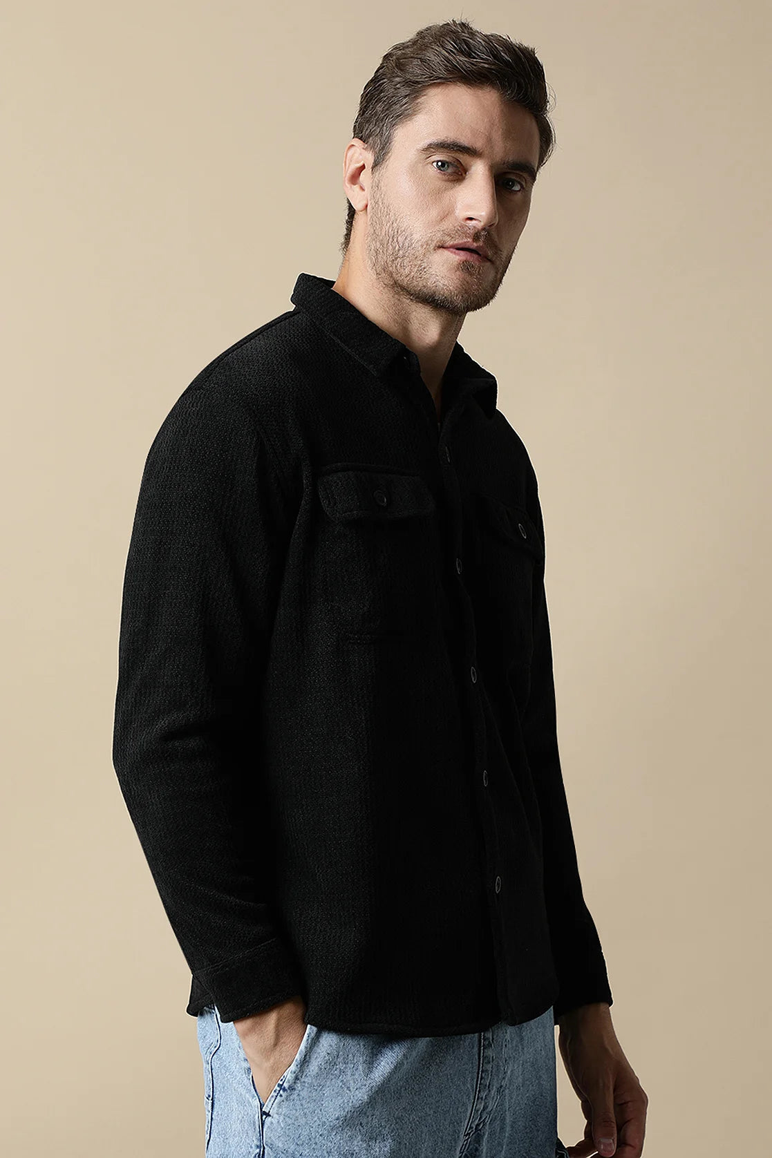 Shop online for a sleek wardrobe upgrade anywhere in India with the Men's Black Textured Shacket from Fort Collins. Featuring dual chest pockets, this shacket is a must-have for the modern man.