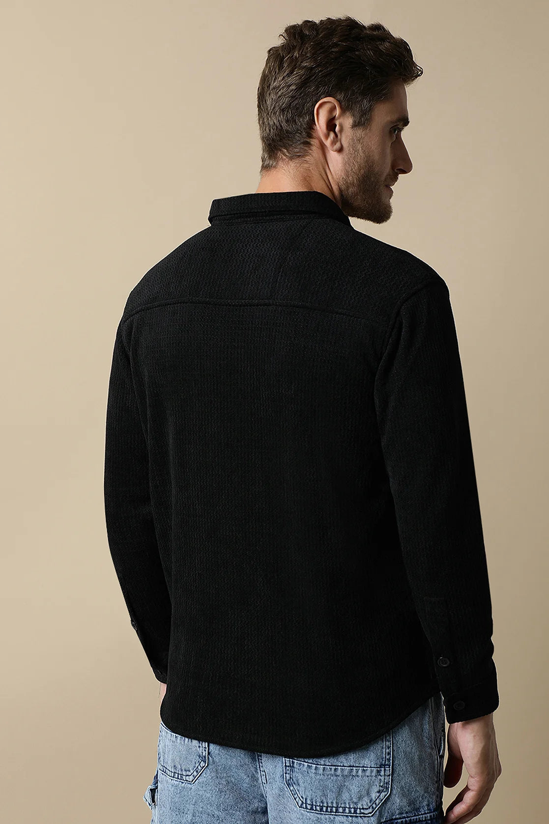 Upgrade your wardrobe with the Men's Black Textured Shacket, featuring dual chest pockets, from Fort Collins. Shop now online and elevate your style in any part of India.