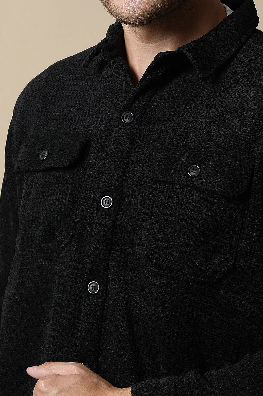 Upgrade your wardrobe with the stylish Men's Black Textured Shacket by Fort Collins. Dual chest pockets add a functional touch to this trendy piece, available for online purchase from anywhere in India.