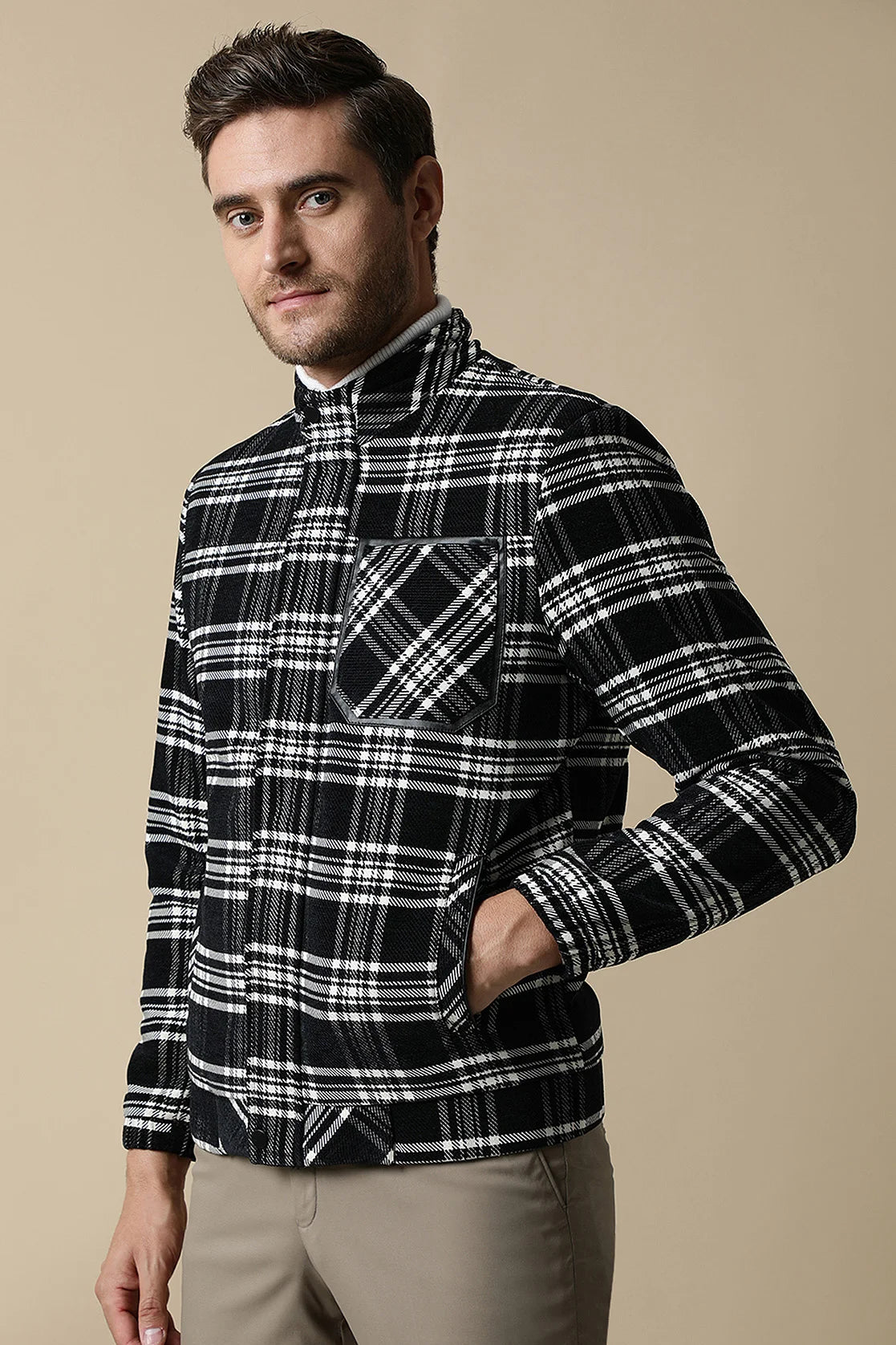 Upgrade your wardrobe with the Fort Collins Men's Black Tweed Plaid Jacket featuring a quilted lining. Shop for this stylish piece online from anywhere in India.