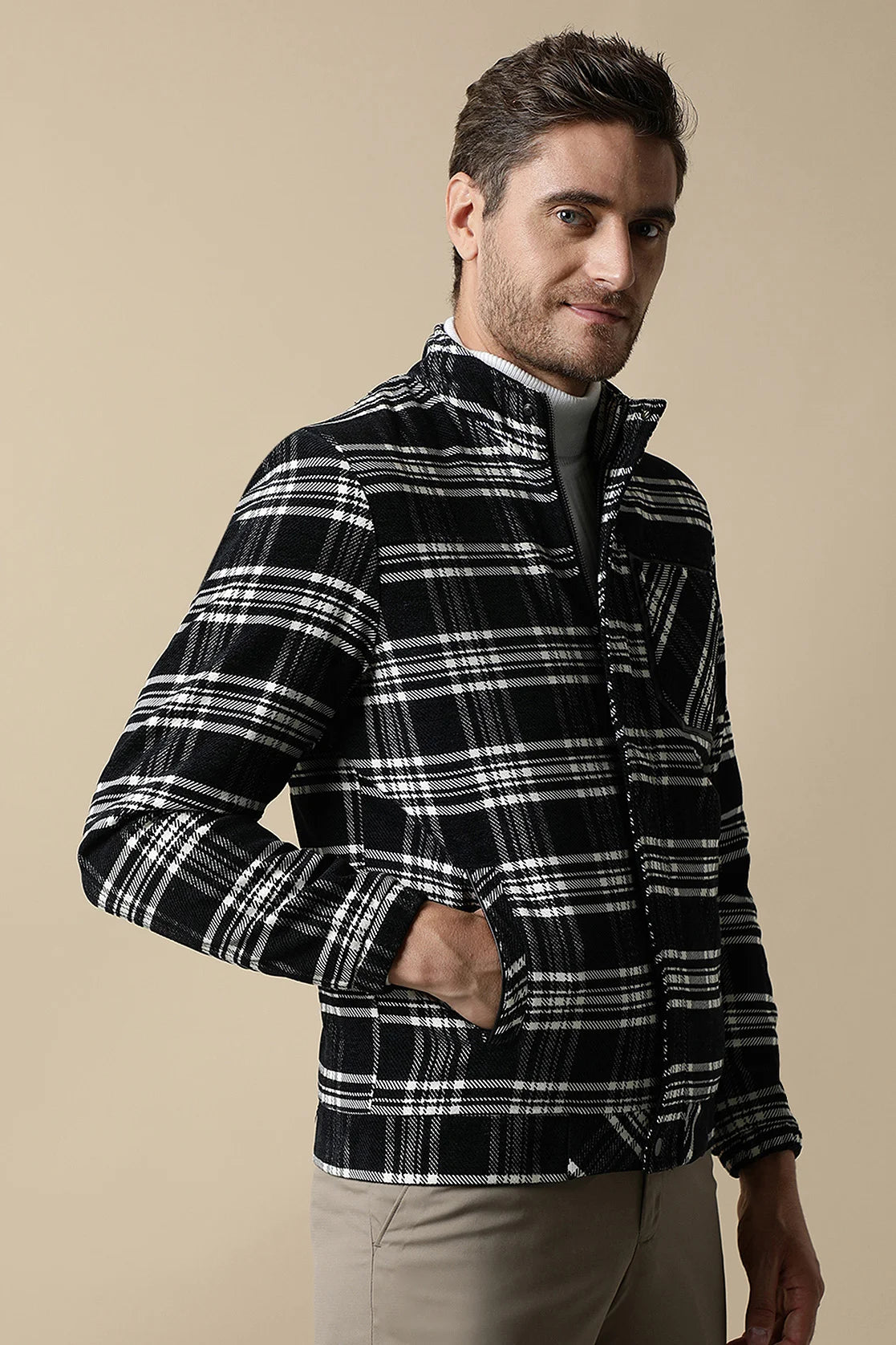 Elevate your style with the Fort Collins Men's Black Tweed Plaid Jacket, complete with a quilted lining. Available for purchase online, this fashionable upgrade is perfect for any wardrobe in India.