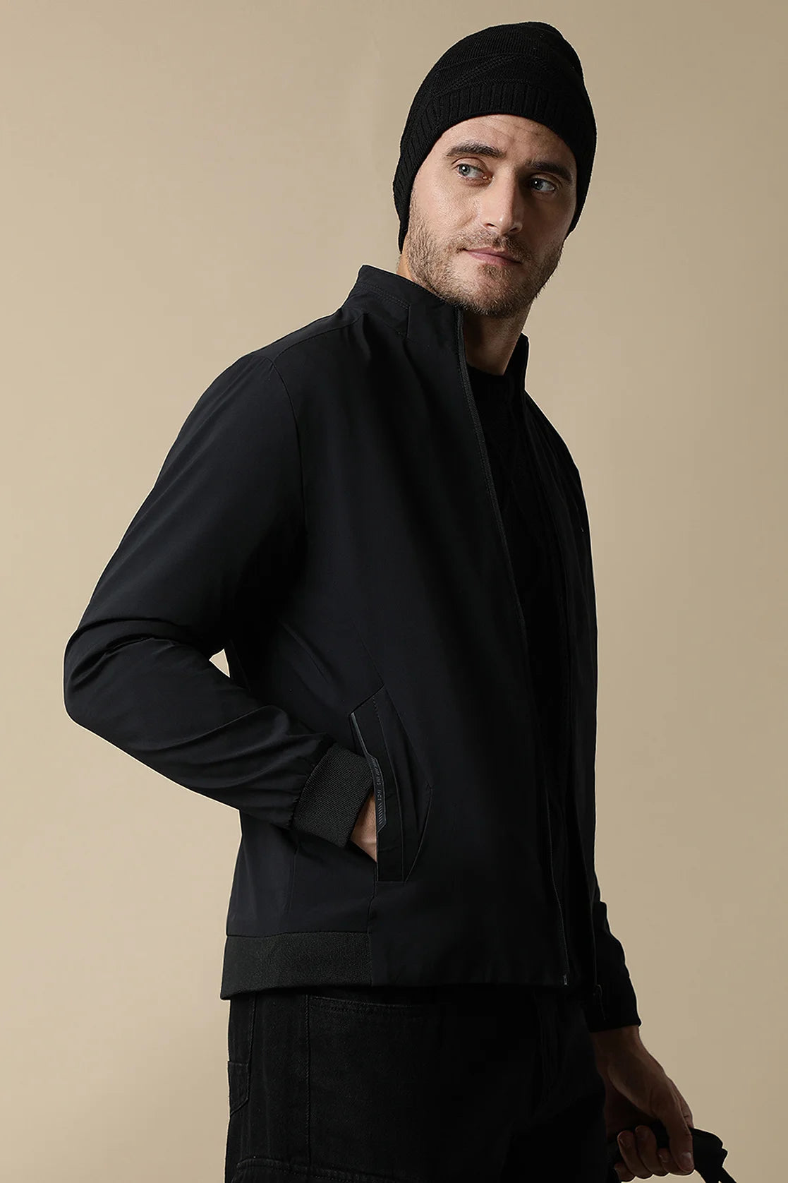 Enhance your wardrobe with the trendy Men's Black Lightweight Windbreaker Jacket by Fort Collins, available for purchase online from anywhere in India.