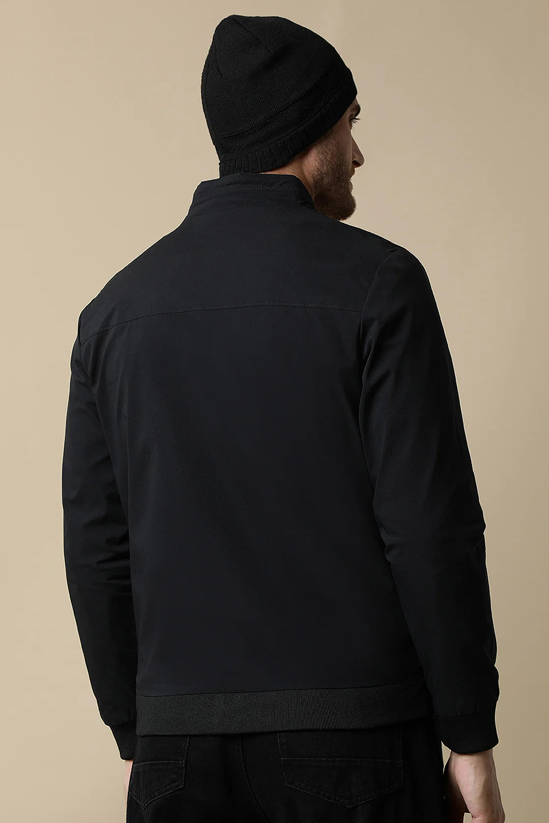 Upgrade your wardrobe with the Men's Black Lightweight Windbreaker Jacket by Fort Collins. Order online now for a stylish addition to your closet from anywhere in India.