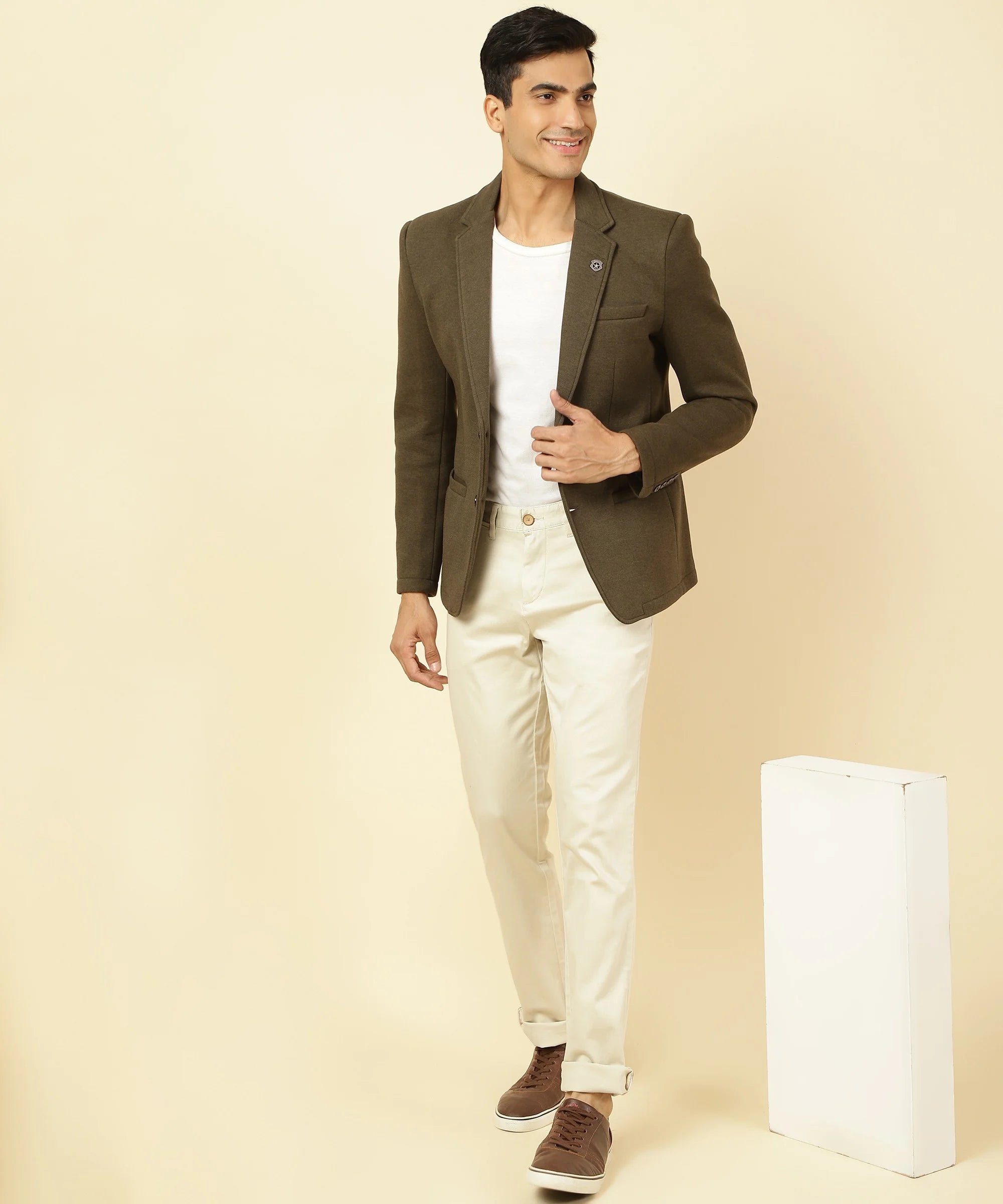 Shop online from anywhere in India for a stylish wardrobe upgrade with Fort Collins' Men's Brown Melange Knitted Blazer, featuring a notched lapel.