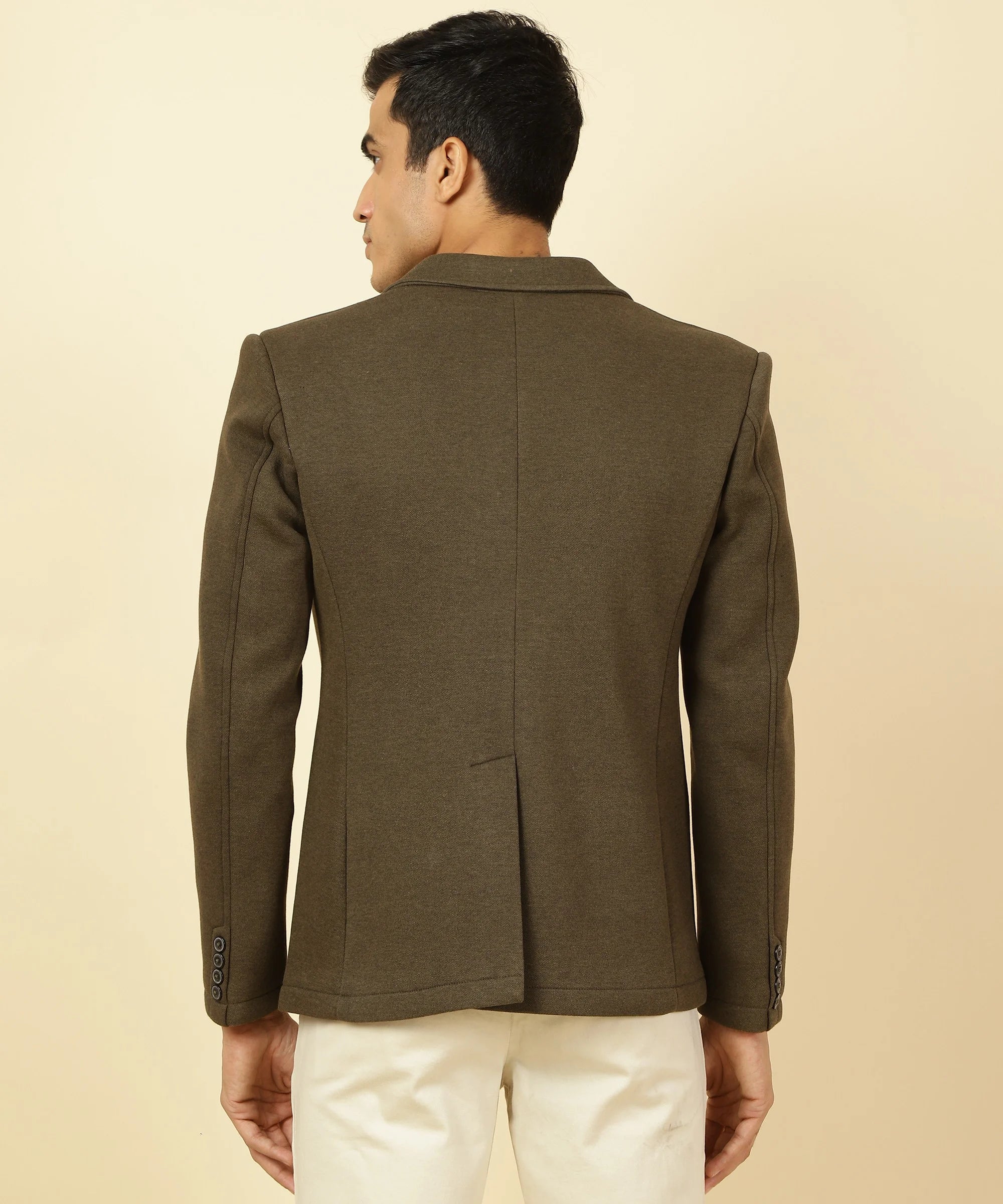 Upgrade your wardrobe with the Men's Brown Melange Knitted Blazer featuring a sophisticated Notched Lapel, available for purchase online from anywhere in India through Fort Collins.