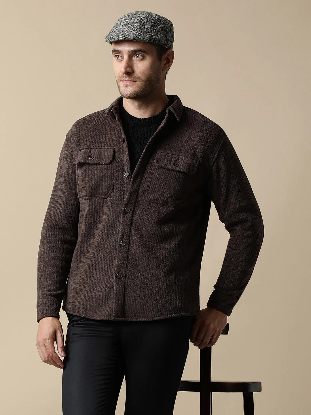 Upgrade your wardrobe with the trendy Fort Collins Men's Brown Textured Shacket, featuring dual chest pockets. Available for purchase online from anywhere in India.