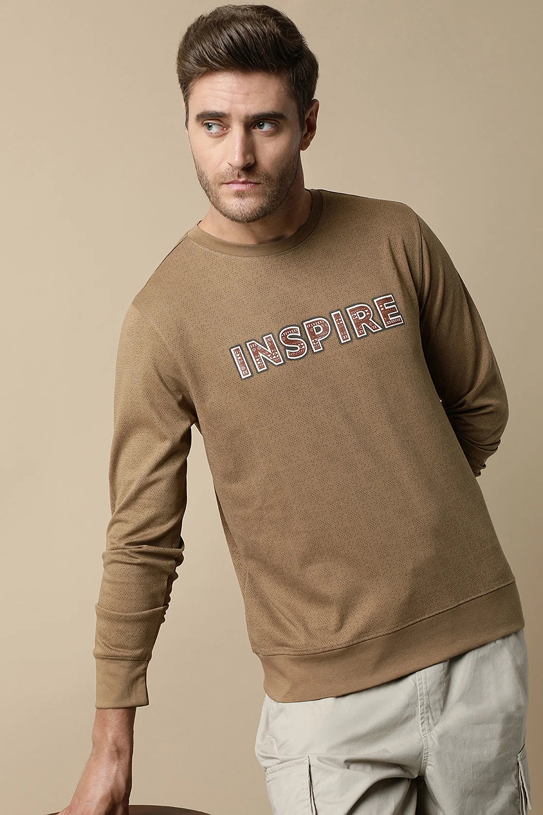 Discover the latest fashion trends with this Men's Camel Color Round Neck Sweatshirt from Fort Collins. Available online, shop now and elevate your wardrobe anywhere in India with style and ease.