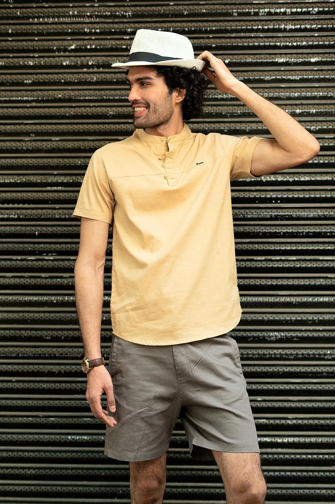 This Men's Casual Beige Mandarin Collar Shirt Kurta from Fort Collins is perfect for any casual occasion.