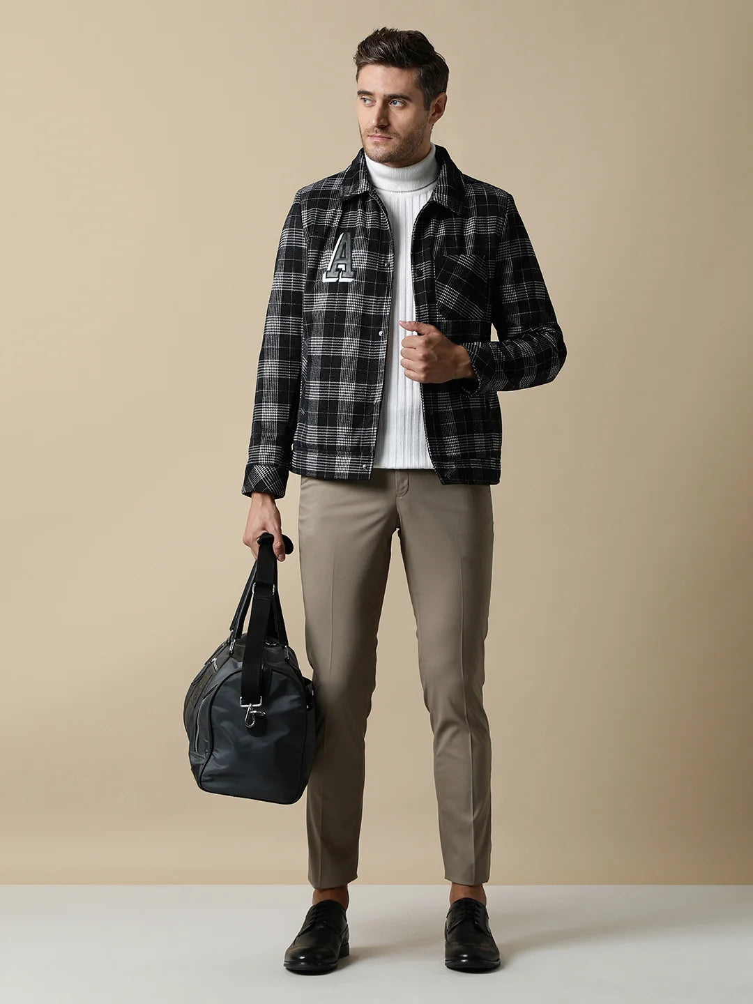 Upgrade your wardrobe with Fort Collins' Men's Checkered Tweed Shacket, featuring a quilted lining, now available for purchase online from anywhere in India.