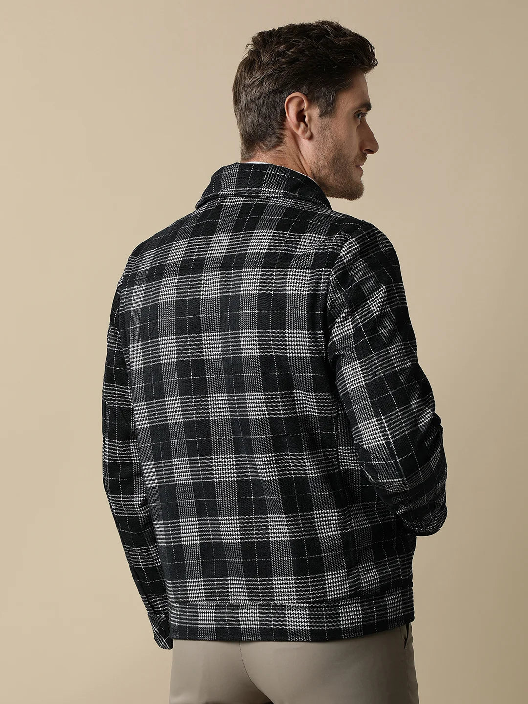 Upgrade your wardrobe with the Fort Collins Men's Checkered Tweed Shacket featuring a quilted lining inside. Shop now from anywhere in India for this trendy must-have item.