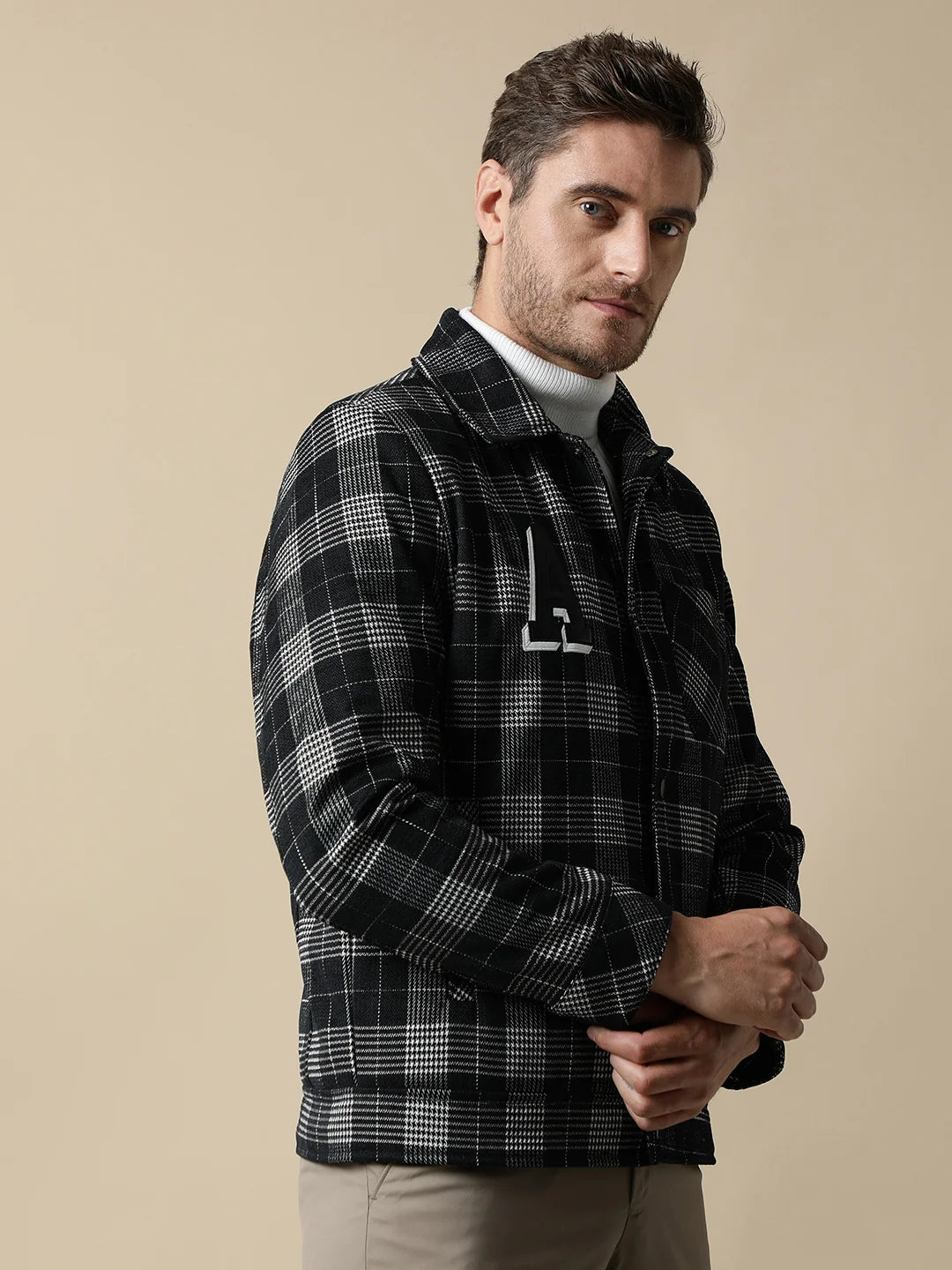 Upgrade your wardrobe with the trendy Fort Collins Men's Checkered Tweed Shacket, featuring a quilted lining inside. Shop now online from anywhere in India for a stylish addition to your collection.