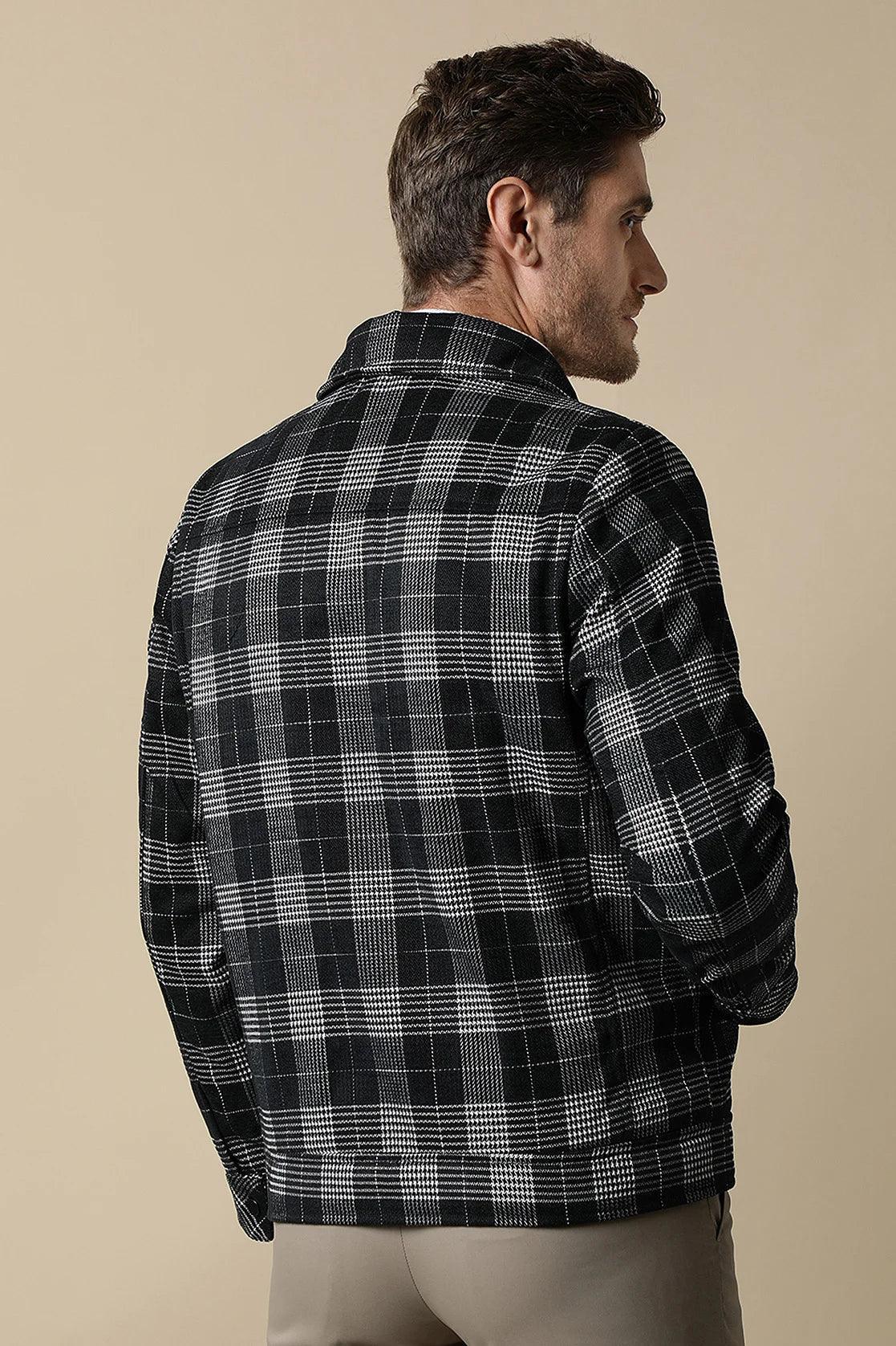 Upgrade your wardrobe with the trendy Fort Collins Men's Checkered Tweed Shacket, featuring a quilted lining inside. Shop now online from anywhere in India for a stylish addition to your collection.