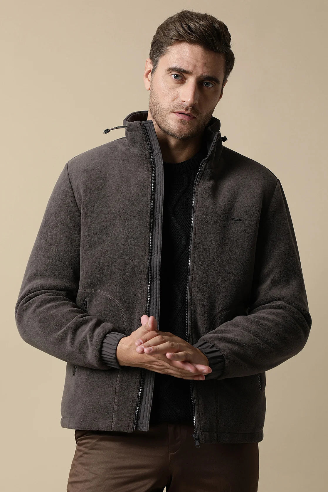 Upgrade your wardrobe with this Fort Collins Men's Coffee Brown Fleece Jacket, featuring a convenient zip-up front. Shop now for a stylish addition to your closet, available for purchase online and shipped to any location in India.