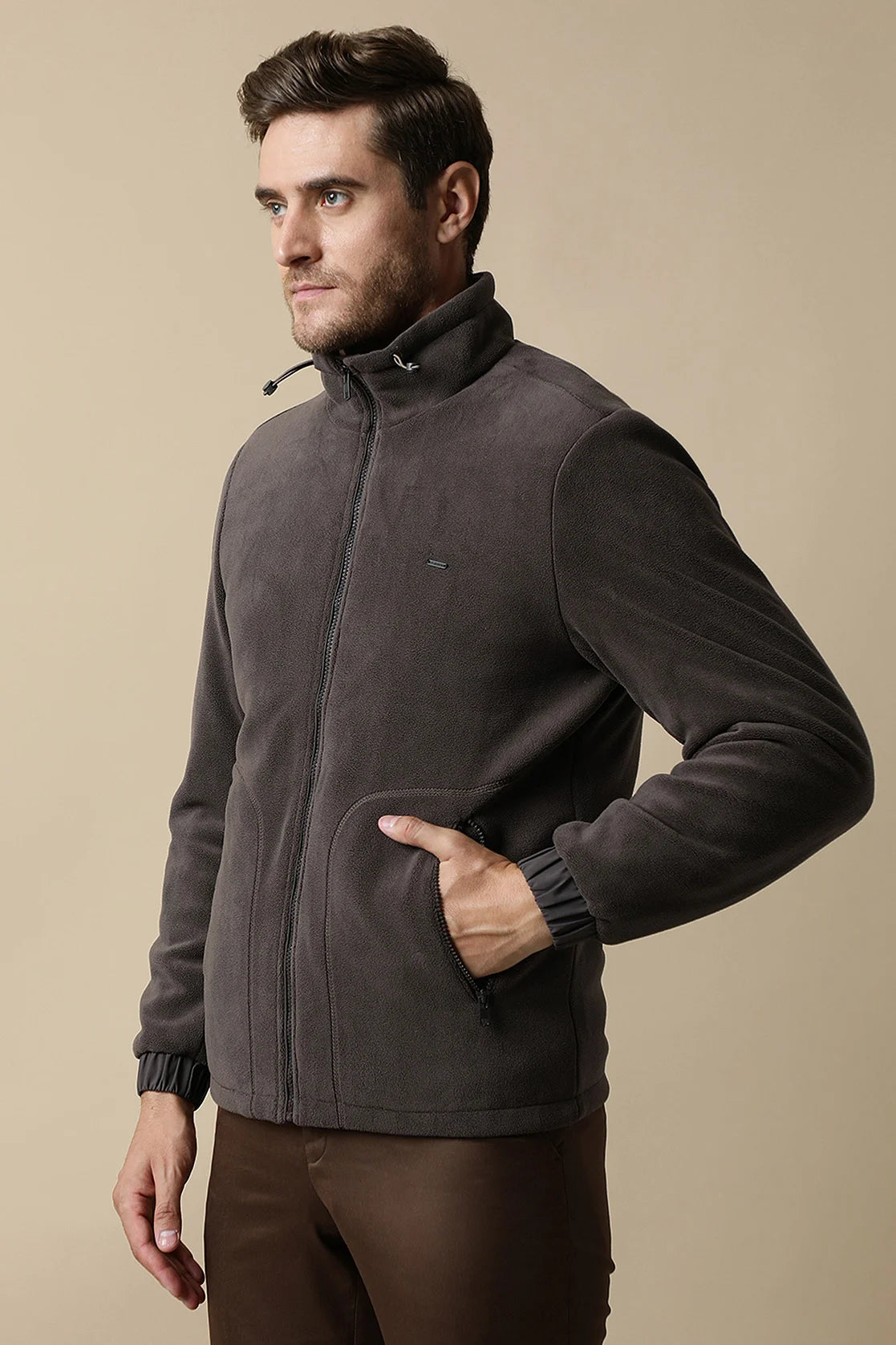 Upgrade your wardrobe with Fort Collins' Men's Coffee Brown Fleece Jacket, featuring a convenient zip-up front for easy wear. Order online now for a stylish and functional addition to your closet from anywhere in India.