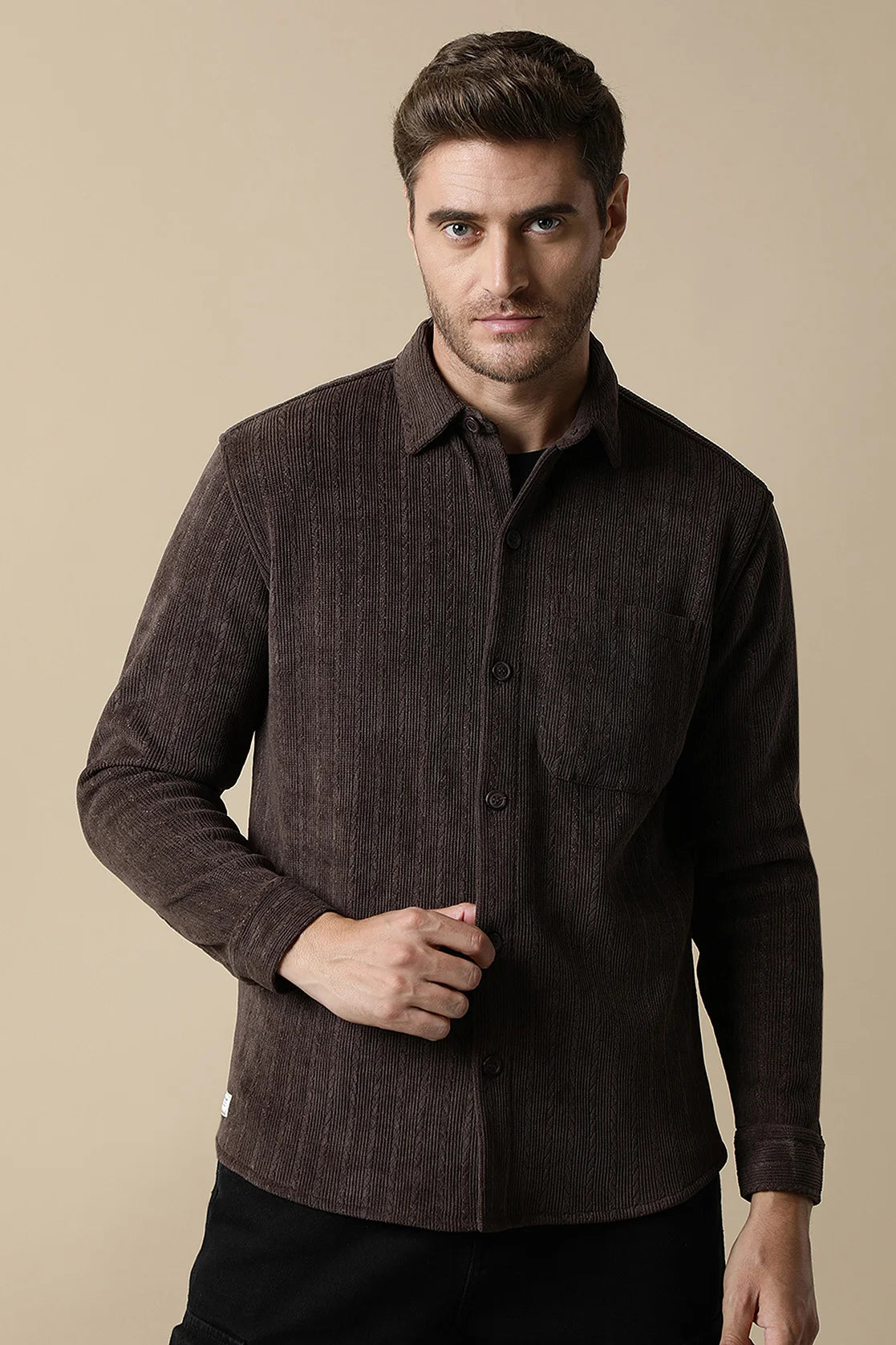 Upgrade your wardrobe with the Fort Collins Men's Coffee Brown Knitted Button Down Shacket, available for purchase online from anywhere in India. This trendy shacket is a must-have for any fashion-forward individual.