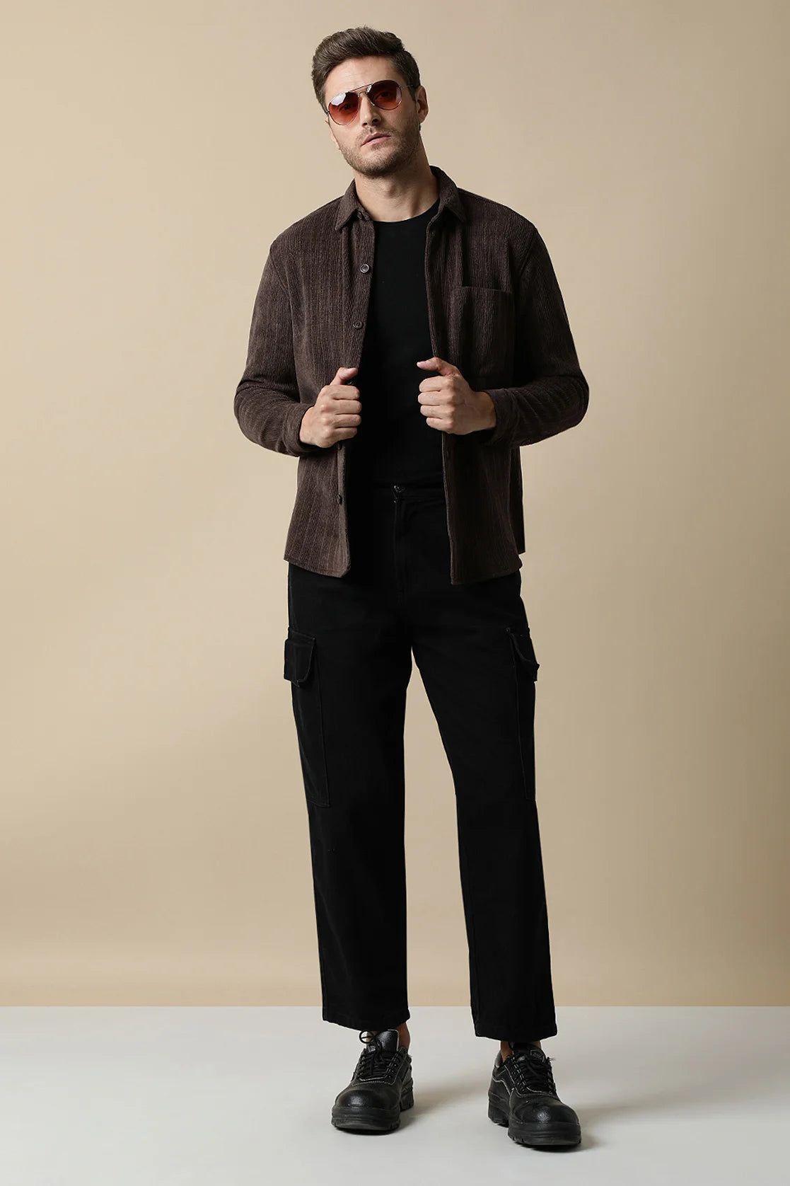 Upgrade your wardrobe with the Fort Collins Men's Coffee Brown Knitted Button Down Shacket. Purchase online from anywhere in India for a stylish and fashionable look.