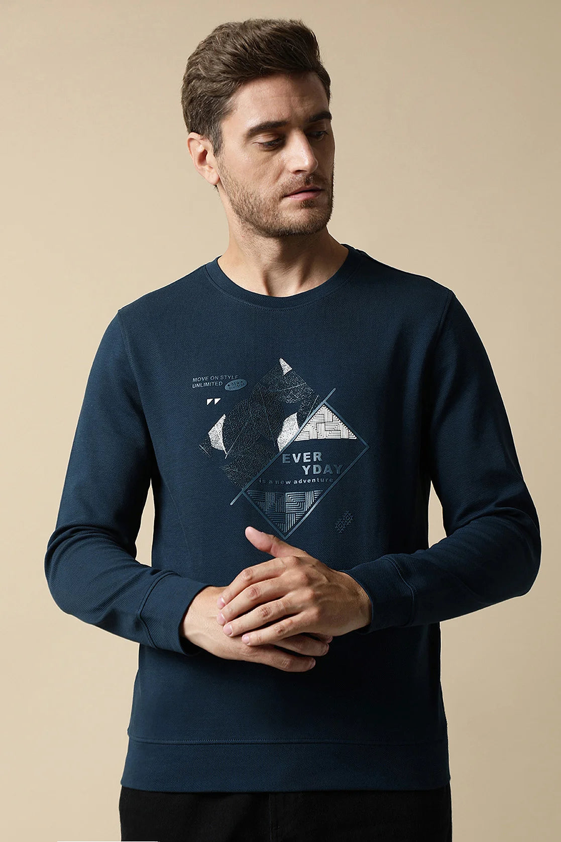 Discover the fashionable Men's Dark Blue Round Neck Sweatshirt with Embossed Graphic by Fort Collins. Shop for the latest wardrobe styles conveniently online throughout India.