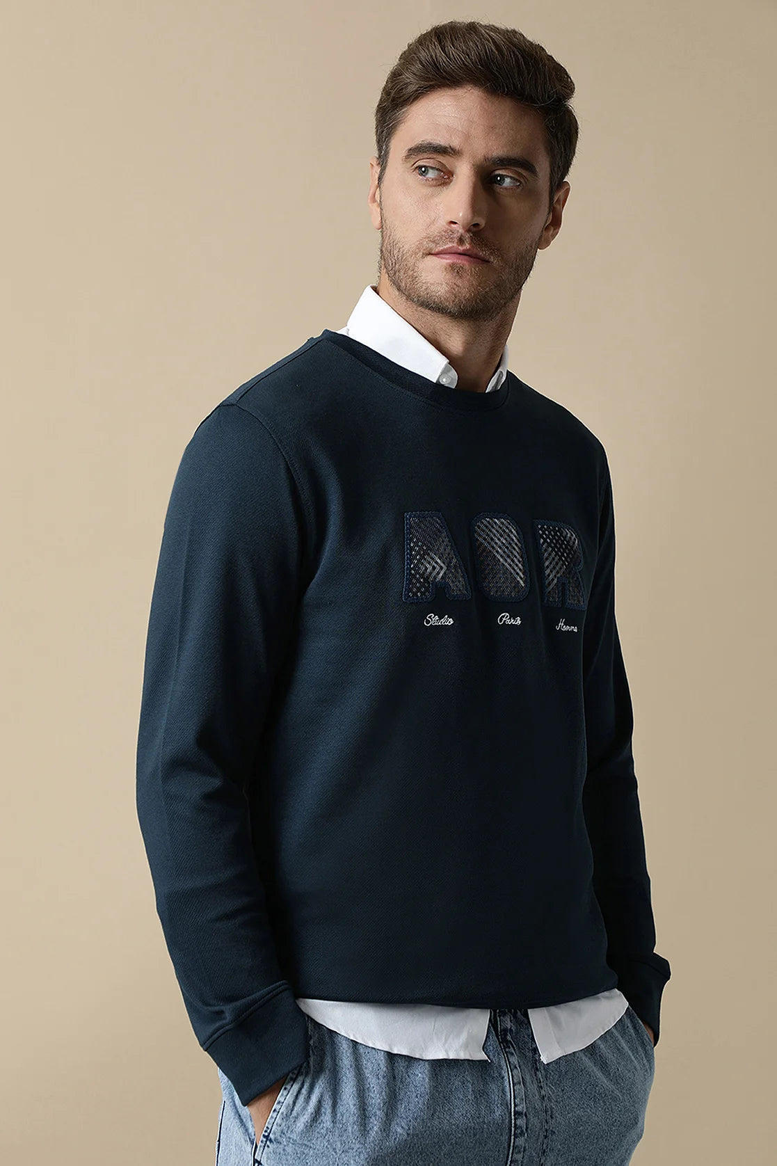 Purchase the Fort Collins Men's Dark Blue Sweatshirt with an Embroidered Chest Design online to elevate your style no matter where you are in India.