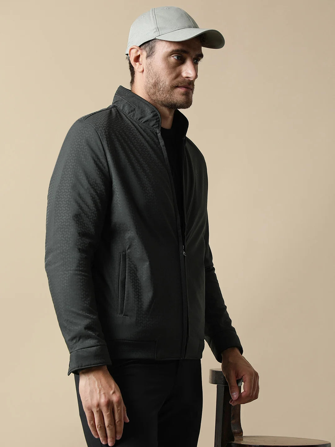 Upgrade your wardrobe with the Men's Dark Green Textured Lightweight Jacket from Fort Collins. Available for purchase online from anywhere in India.