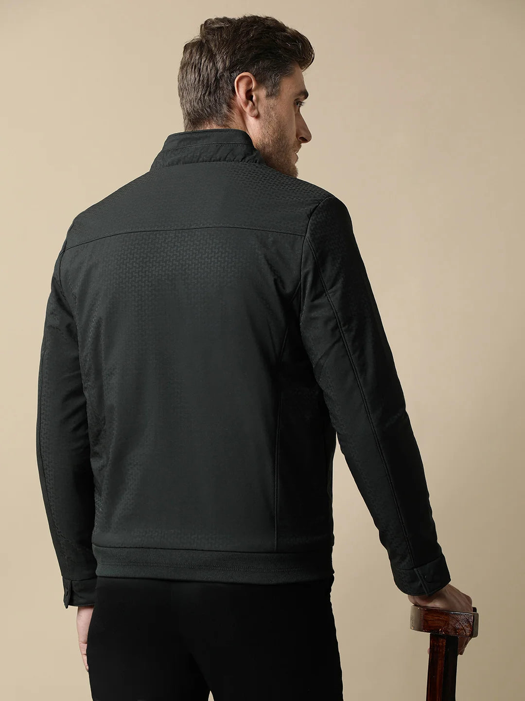 Expand your wardrobe options with the Men's Dark Green Textured Lightweight Jacket from Fort Collins. Accessible online, this stylish piece adds a modern touch to your collection no matter where you are in India.