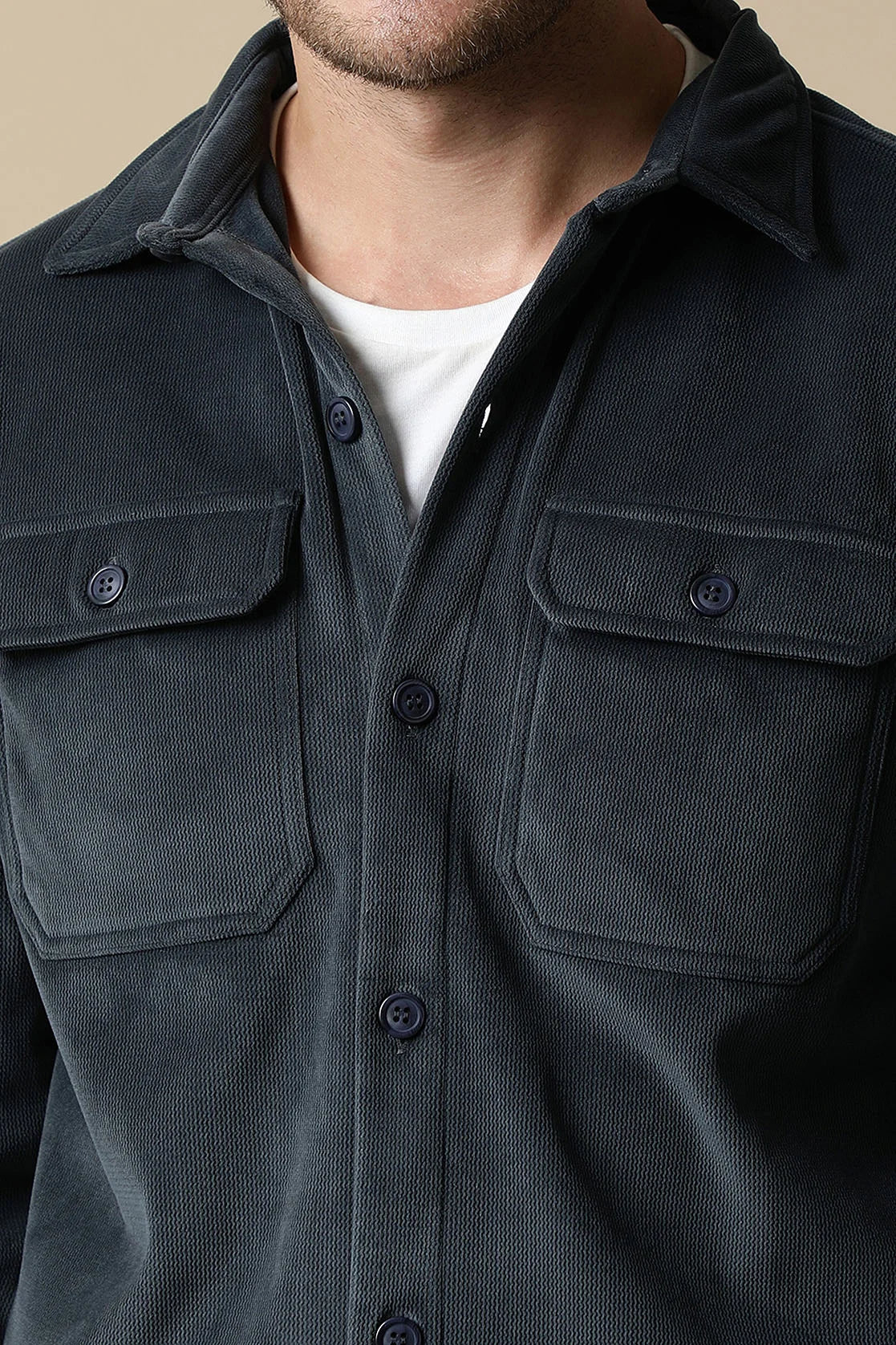 Upgrade your wardrobe with our Men's Dark Grey Corduroy Shacket, featuring dual chest pockets. Available online for purchase from anywhere in India with Fort Collins.