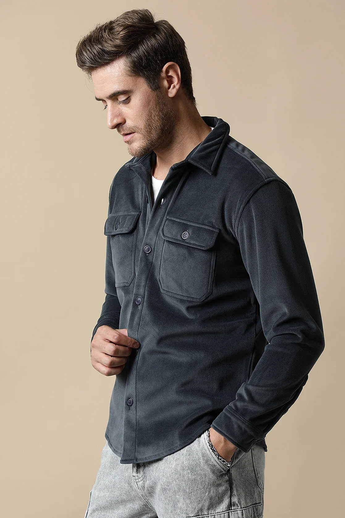 Discover the stylish and versatile Men's Dark Grey Corduroy Shacket from Fort Collins, featuring dual chest pockets. Upgrade your wardrobe with this must-have piece, available online for easy shopping from anywhere in India.