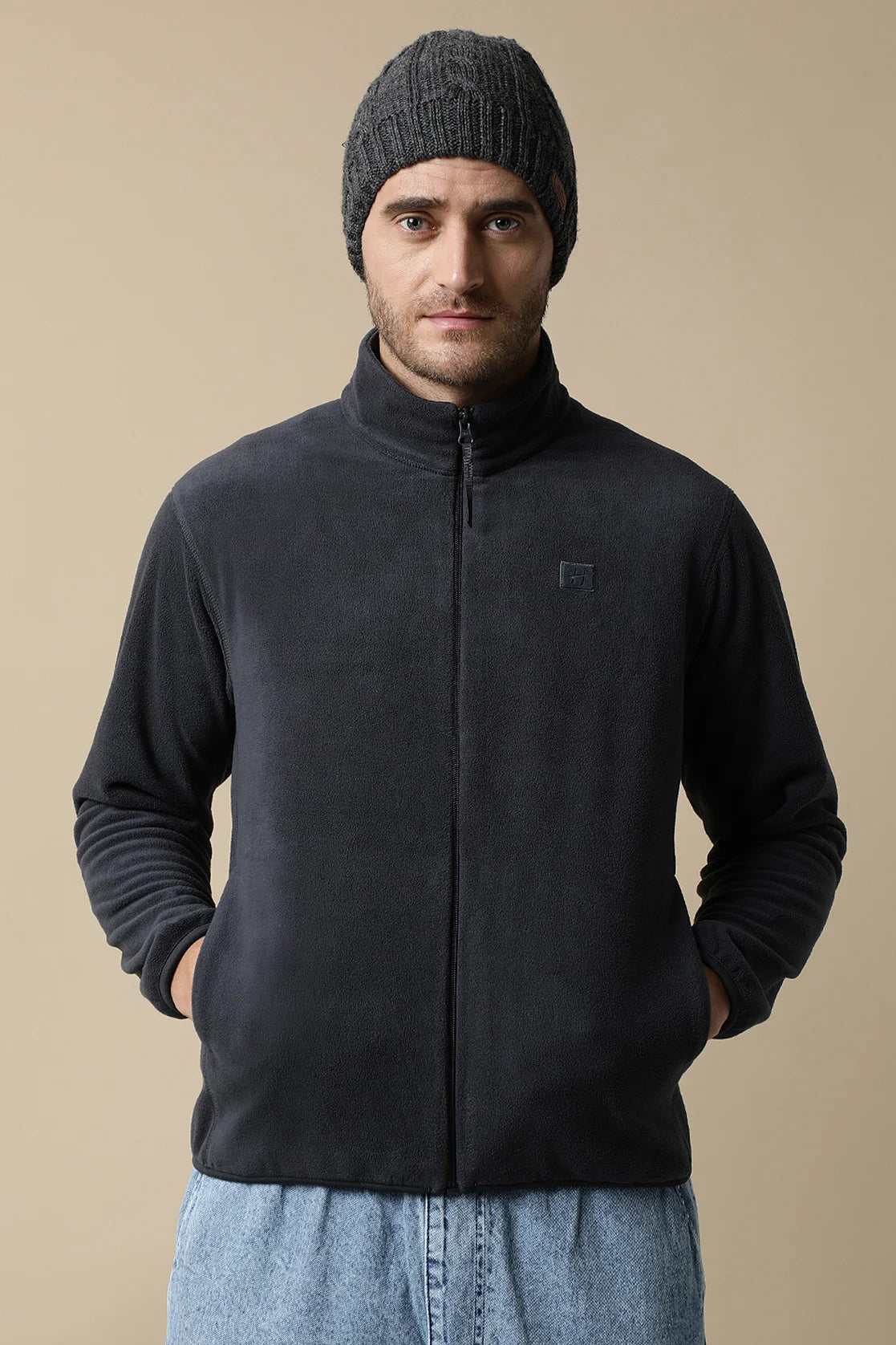 Upgrade your wardrobe with the Fort Collins Men's Dark Grey Full-Zip Fleece Jacket, available for purchase online from anywhere in India. Enhance your style with this trendy jacket option.